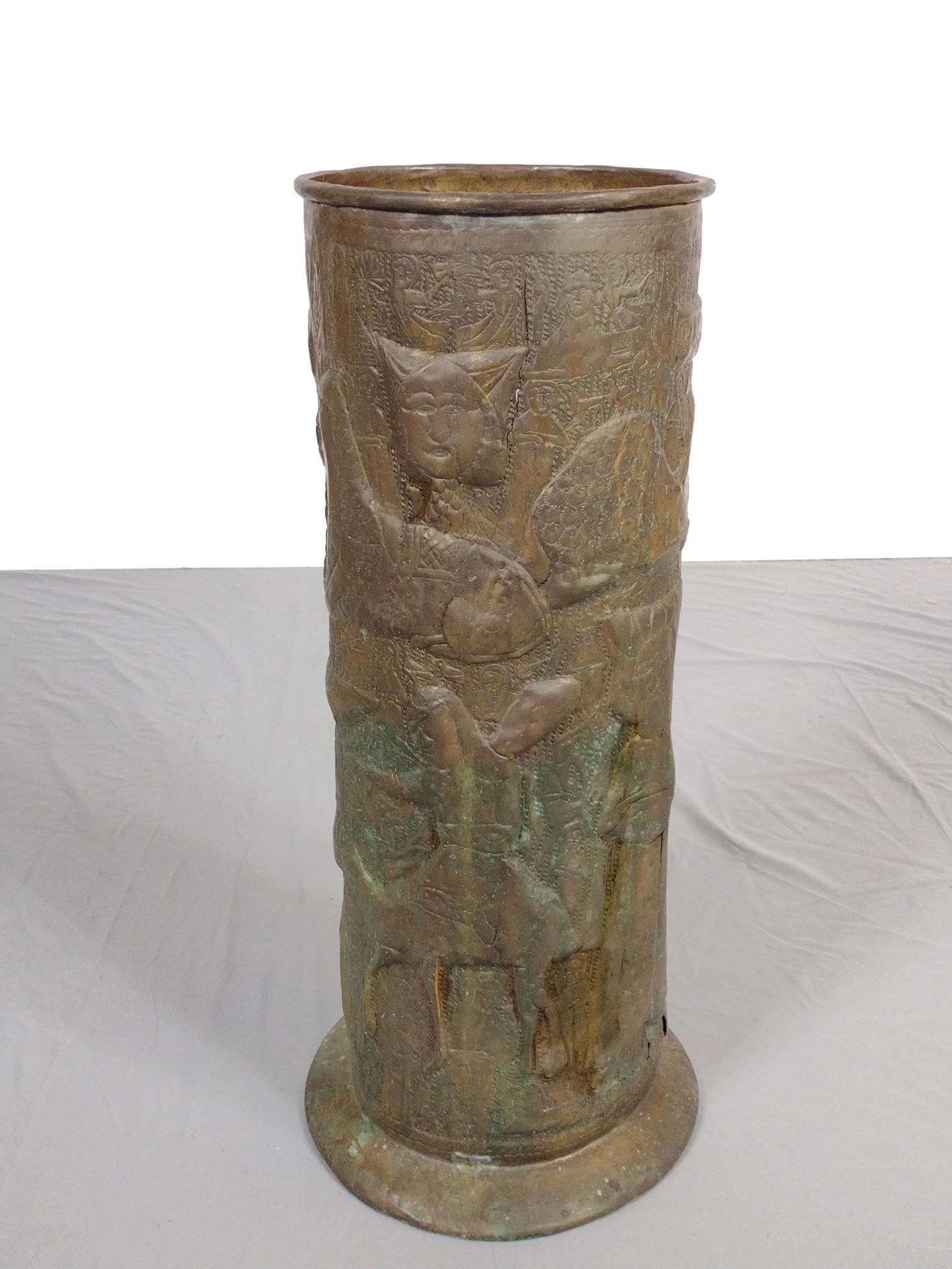 Brass Pictorial Umbrella Stand: 9-3/4" diameter X 22" high. Some oxidation. Also has damage at bottom.