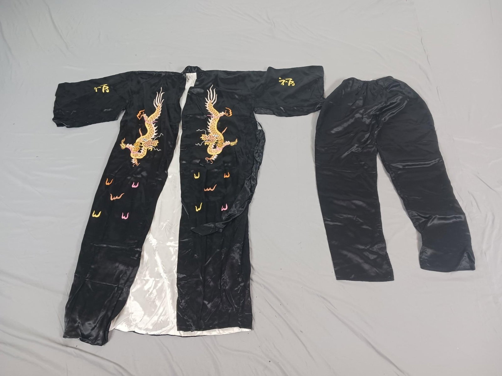 Black Kimono with Dragons and Long Pants: Kimono: 52" sleeve to sleeve wide x 50" total length. Pants: 11" wide at waist x 40-1/2" total length.