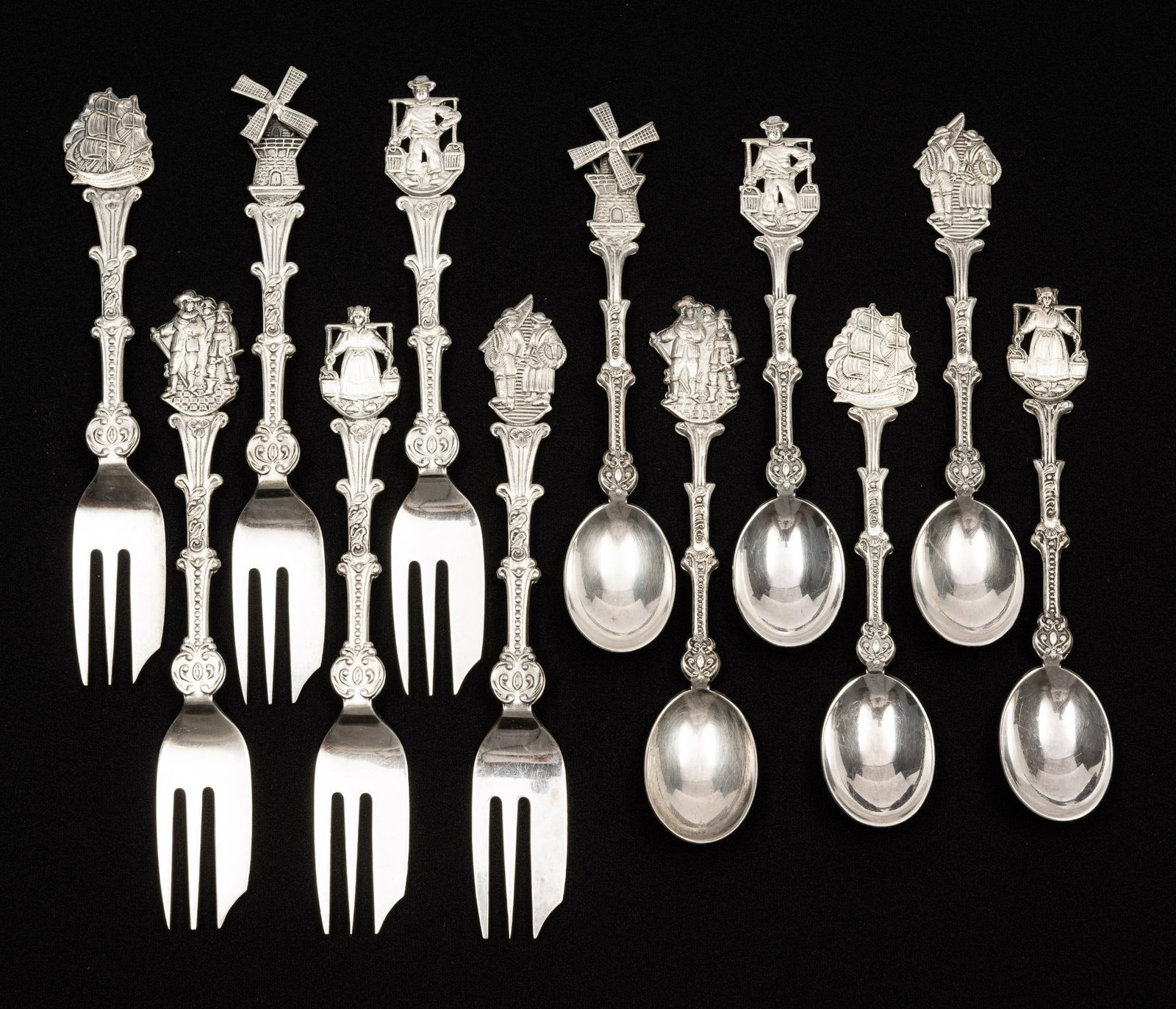 12 Danish Sterling Silver Souvenir Flatware: Includes 6 spoons and 6 forks. All marked Made in Holland. 4-1/2" to 5-1/2" long. 6.01 ozt total.