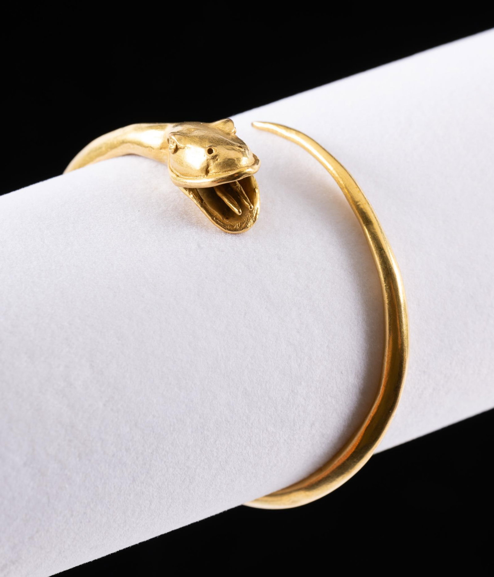 Vintage Gold-Filled Snake Bracelet: 2 3/4" inner horizontal dimension hand fabricated snake bracelet with designer stamp, not identified. 34.5 grams, gold filled.