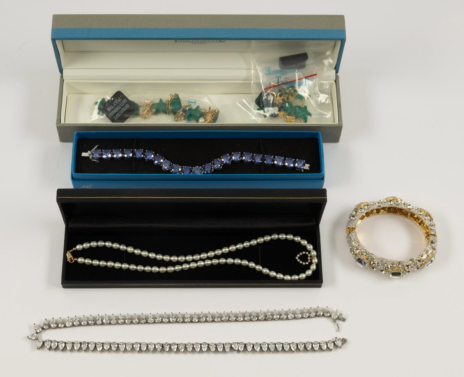 Costume Jewelry incl Bracelets: Includes necklaces and bracelets. 18" to 20" long.