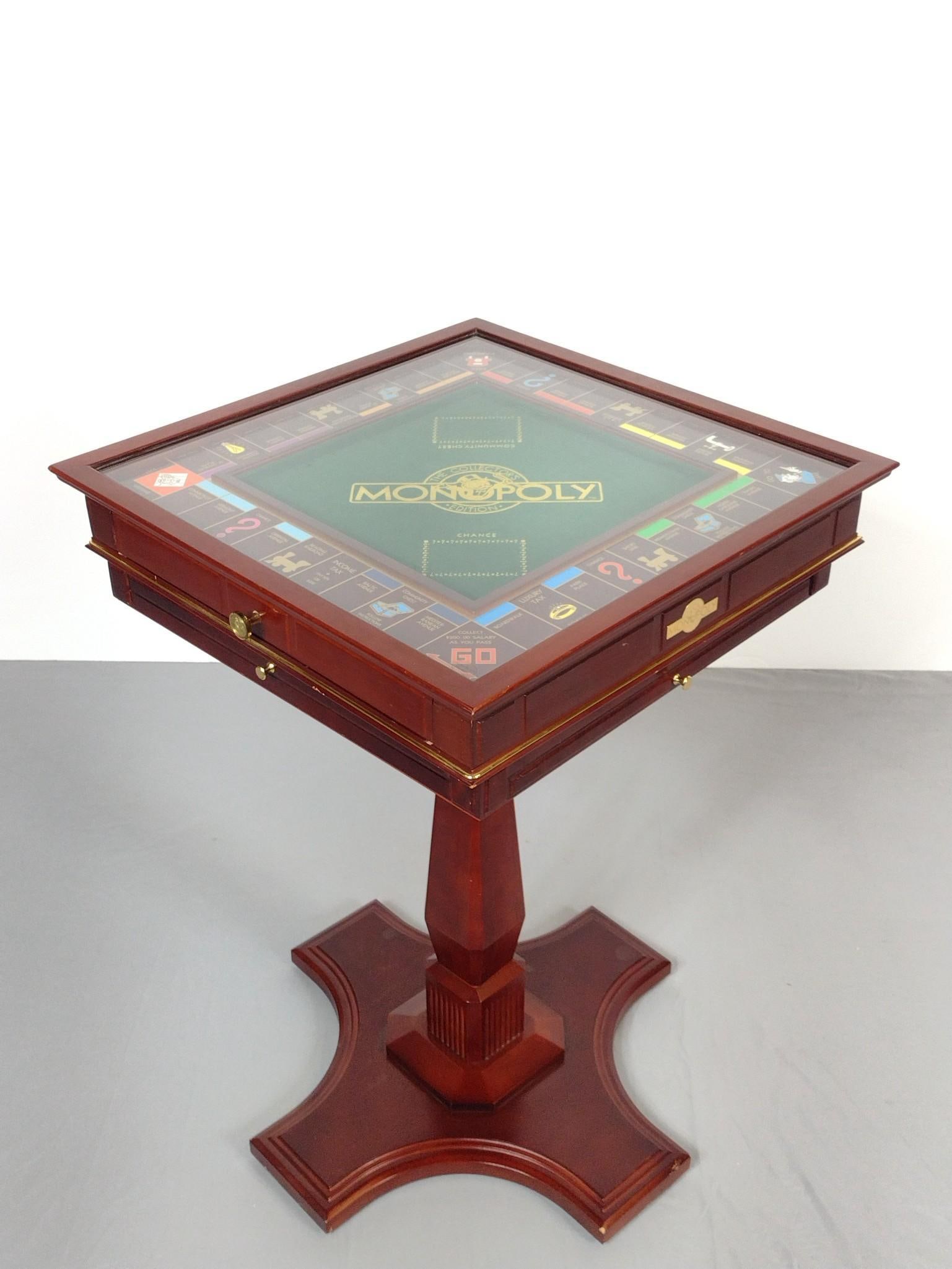 Franklin Mint Collectors Edition Monopoly: NOT ELIGIBLE FOR IN-HOUSE SHIPPING. Overall with Stand 22" wide X 22" deep X 32-3/4" high. Has a few scratches.