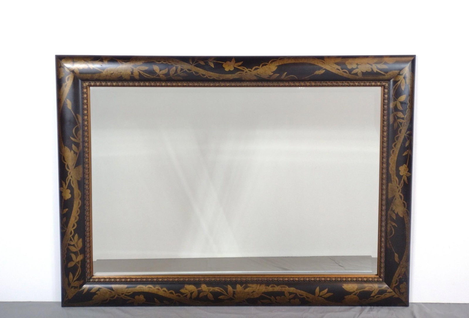 Wall Mirror with Vine Pattern Frame: NOT ELIGIBLE FOR IN-HOUSE SHIPPING. 36-1/2" high X 50-1/2" wide.
