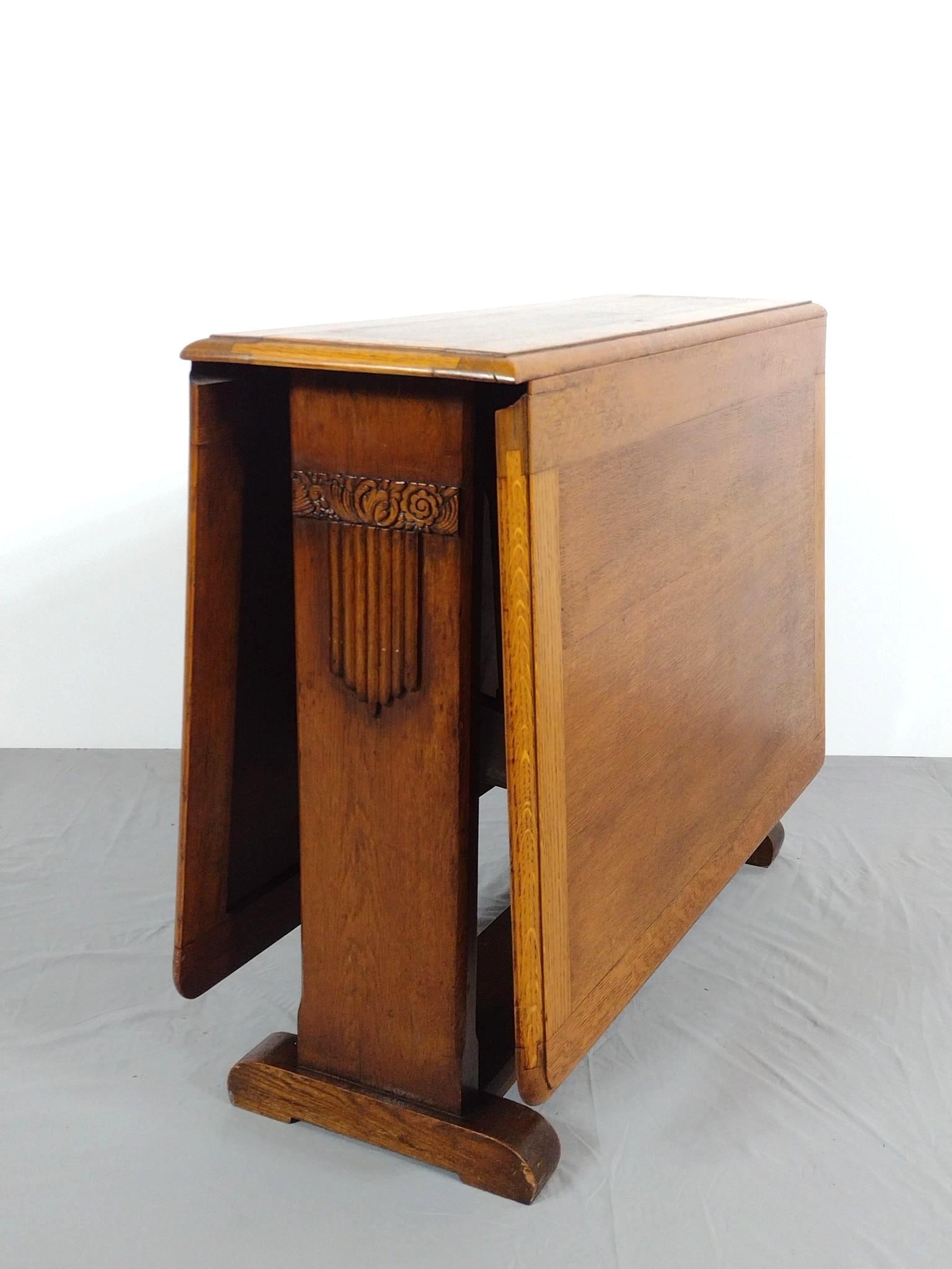 Drop Leaf Table: NOT ELIGIBLE FOR IN-HOUSE SHIPPING. Open 58", closed 12" wide X 36" deep X 29" high. Has some light scratches.