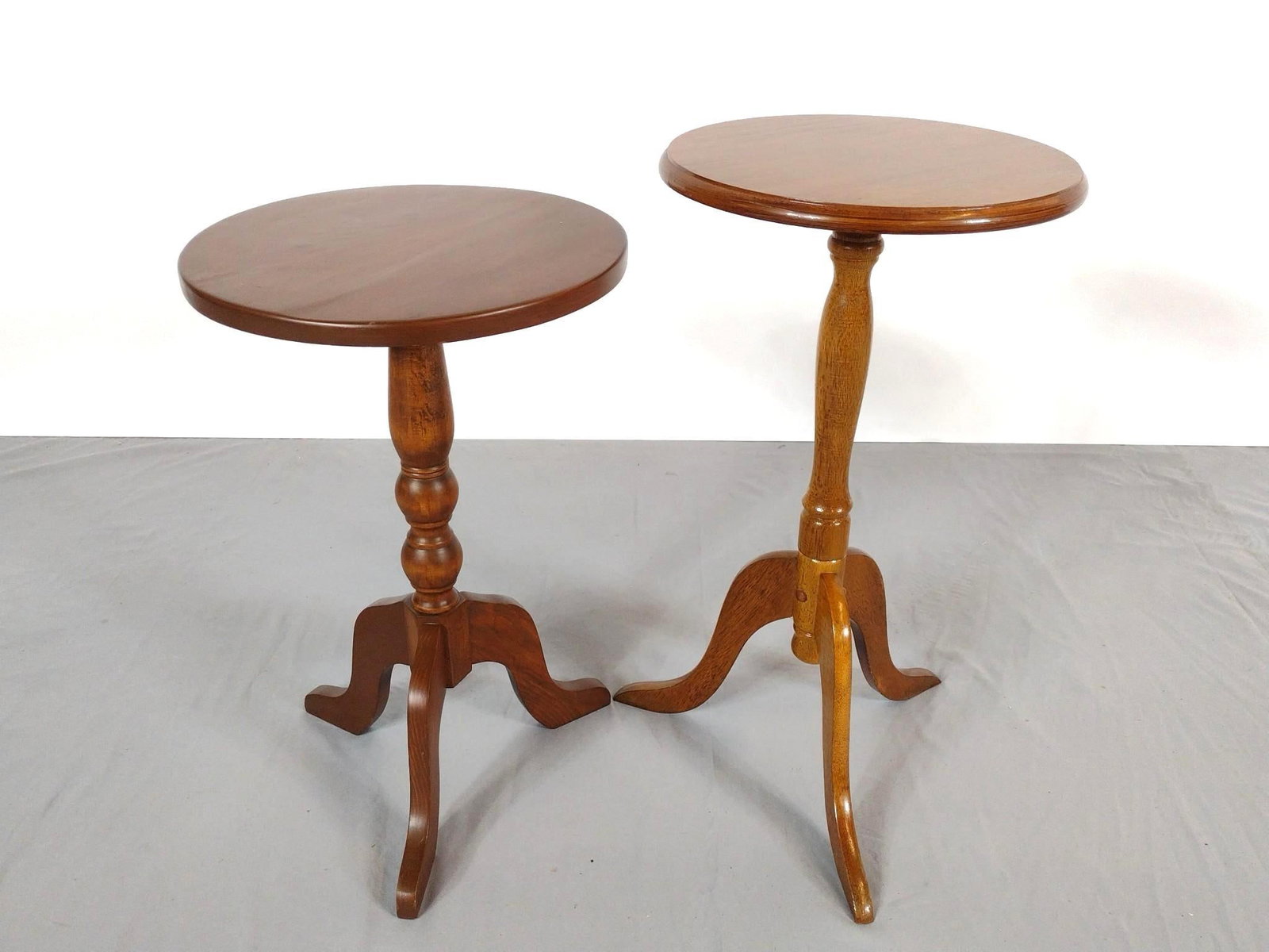 Two Candle Stands: NOT ELIGIBLE FOR IN-HOUSE SHIPPING. 12" to 12-1/4" diameter X 20" to 22" high. No manufactures name found.
