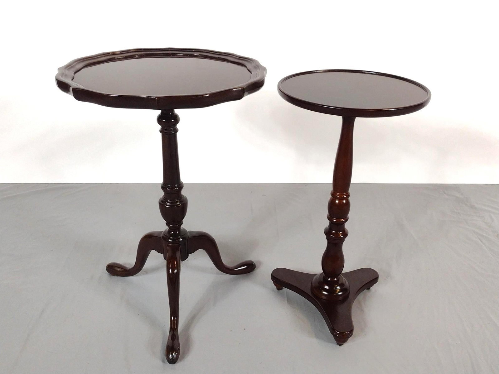 Two Candle Stands Incl The Bombay Company: NOT ELIGIBLE FOR IN-HOUSE SHIPPING. 12" to 16-1/2" diameter X 22" to 23" high. No manufactures name found on one.