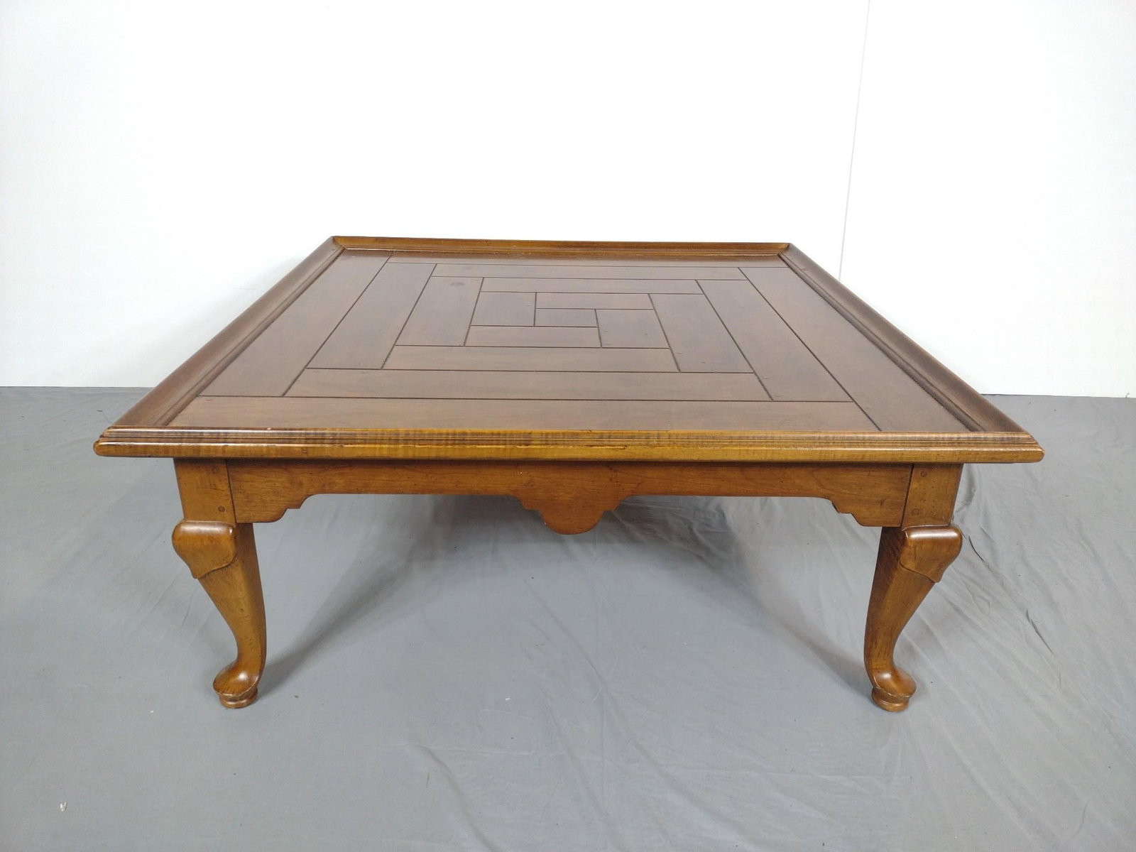 Drexel Heritage Coffee Table: NOT ELIGIBLE FOR IN-HOUSE SHIPPING. 40" wide X 40" deep X 16-1/2" high. Has some light scratches.