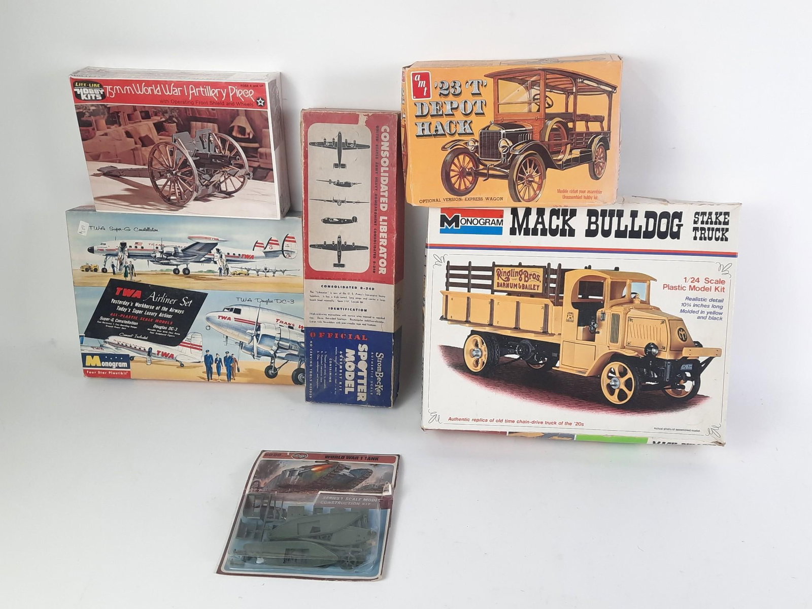 6 Hobby Kits incl Historical Cannons: Includes 1.) Mack Bulldog Stake Truck in original box. 1/24 scale. Unassembled. Box with wear and some crushing. 2.) AMT '23 T Depot Hack in original box. 1/25 scale. Unassembled. Box with some wear a