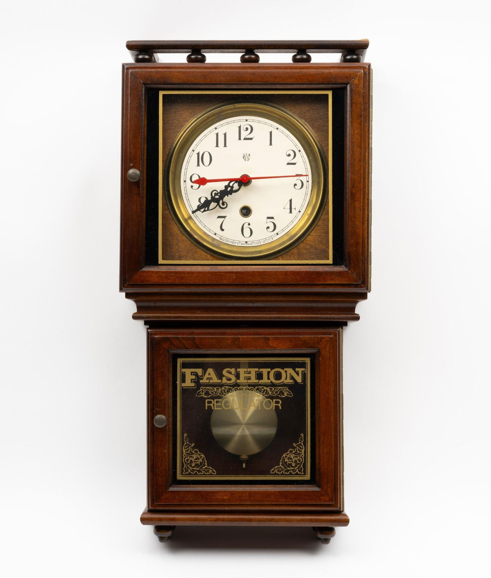 Waterbury Fashion Regulator Wall Clock: NOT ELIGIBLE FOR IN-HOUSE SHIPPING. Starts and stops. 9-3/4" wide x 4-3/4" deep x 19-1/2" high.