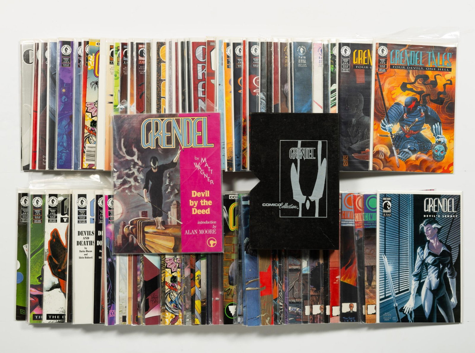 Approx. 100 Grendel Comics: Approx. 100 Grendel Comics. Includes early Comico run, War Child, Tales, Various mini series, and Grendel slip case. Many keys. Average condition VF.