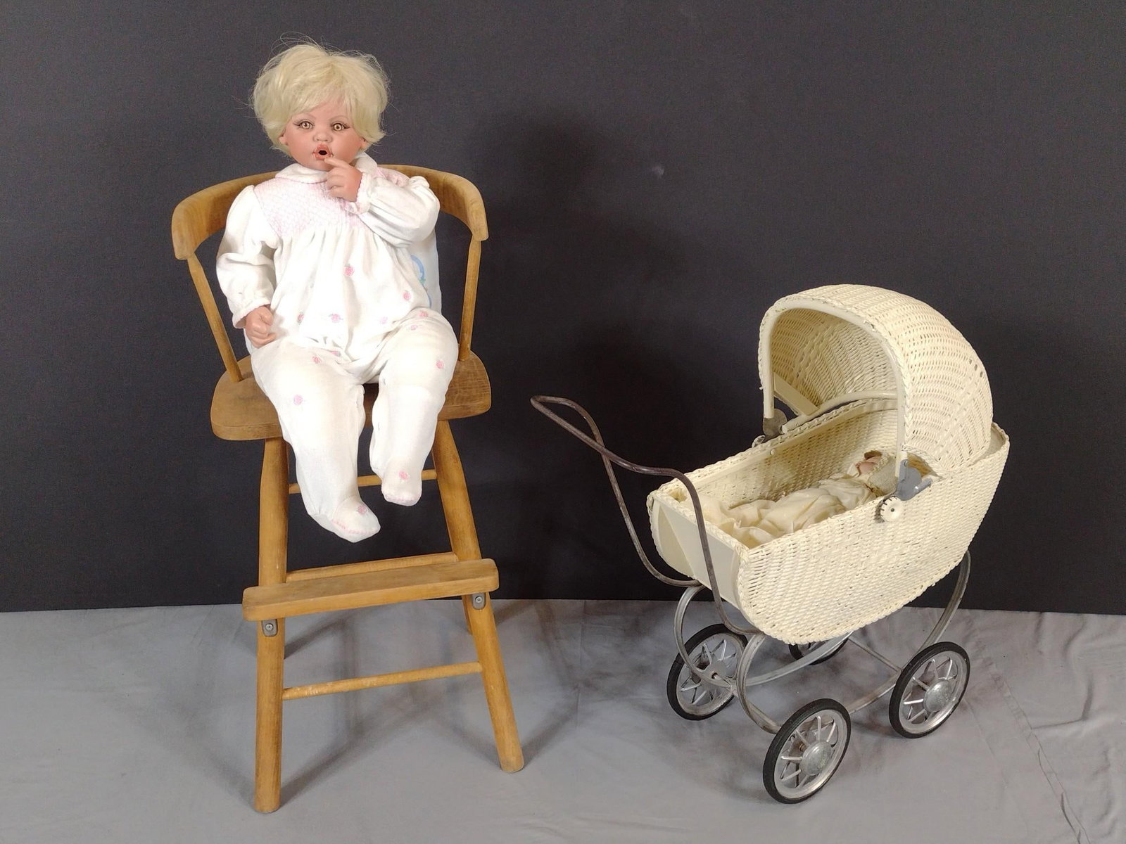 Fayzah Spanos Doll on High Chair and P.M. Grete Doll in Pram: NOT ELIGIBLE FOR IN-HOUSE SHIPPING. Overall 28" to 38" high.