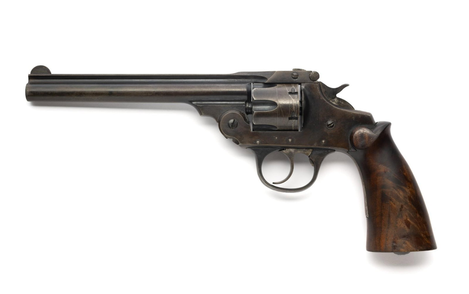 Iver Johnson Topbreak Double Action Revolver, Caliber .32 Centerfire: Serial Number: 65765 Design: This topbreak .32 double action revolver is marked on the barrel rib "Iver Johnson's Arms & Cycle Works/Fitchburg, Mass., U.S.A." This dates the revolver to pre-WWII vinta