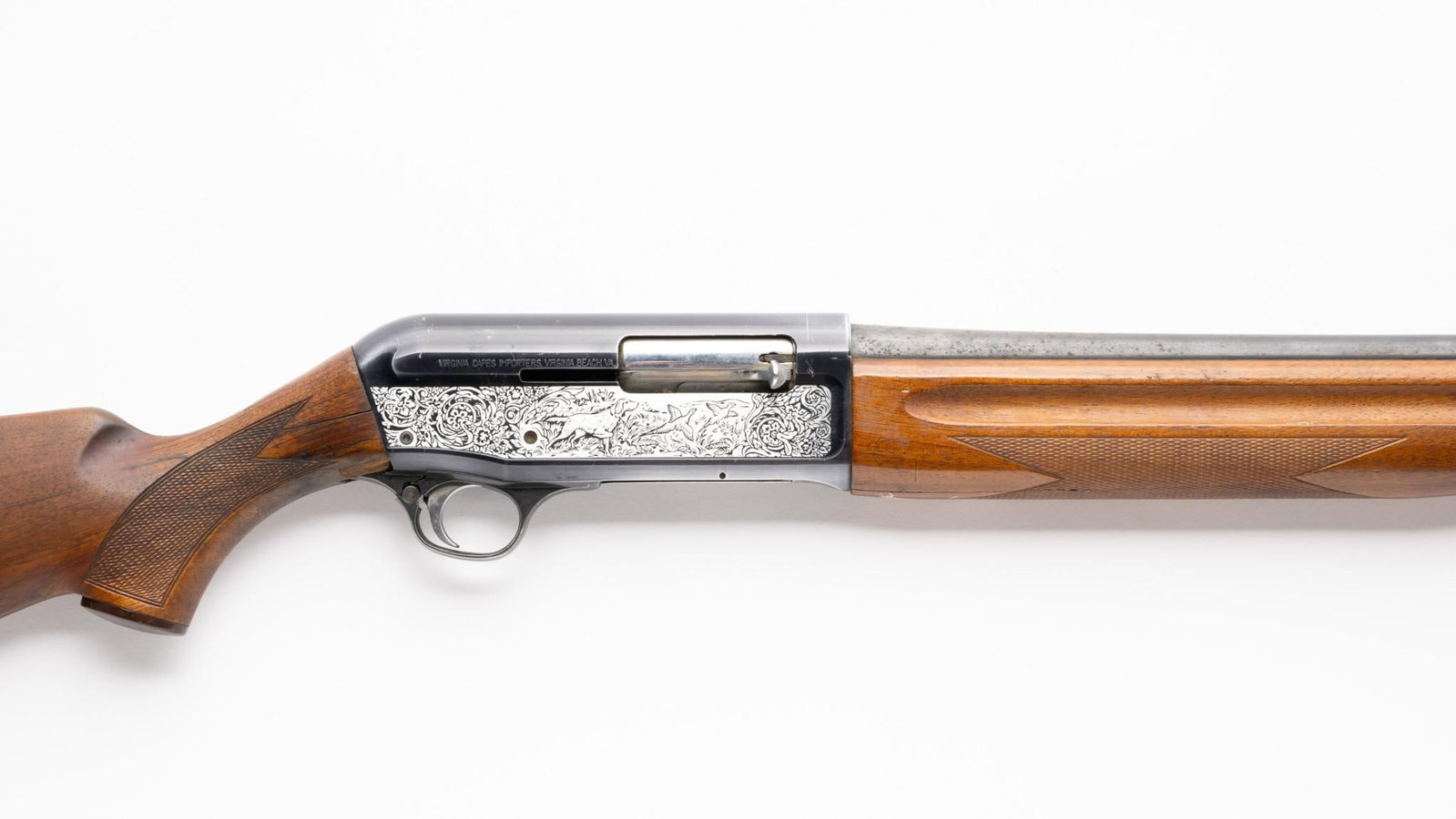 VCI "Dynamic Auto" Semi Auto Shotgun, 12 Gauge: Serial Number: F98643 Design: The VCI "Dynamic Auto" is a semi automatic shotgun made in Japan by NRS Gun Mfg. Co. and imported by Virginia Capes Importers of Virginia Beach, VA. This gun has a 28" ri