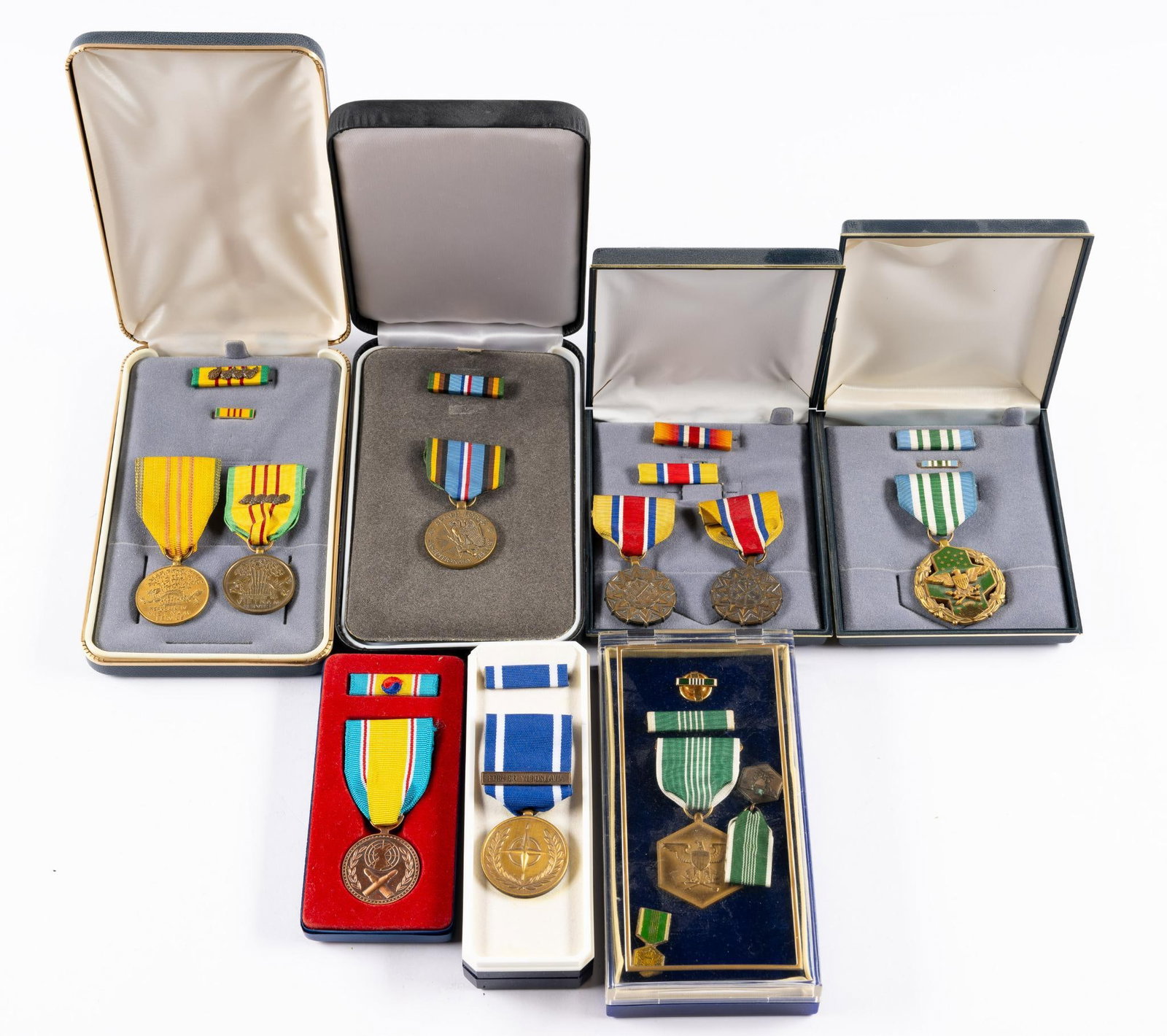 10 Military Medals: Some in original boxes. Includes Korean War Medal, Vietnam Medal, and more. 2-3/4" to 3-1/4" long.