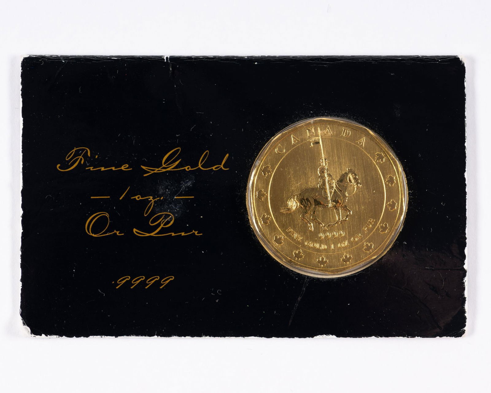 1997 Canada Mountie Maple Leaf Gold Coin (1 of 2)