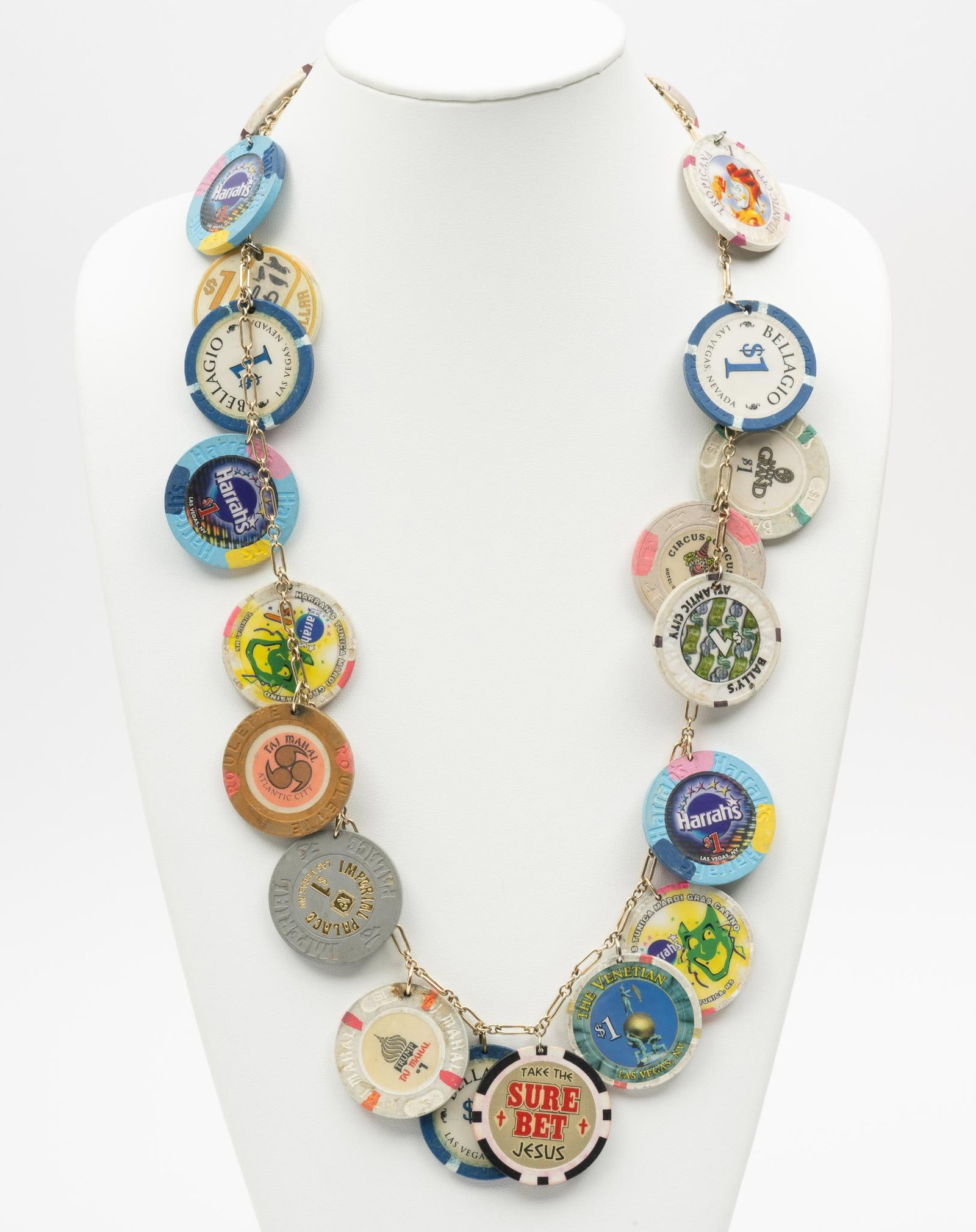 Casino Chip Necklace On Gold Filled Chain: 20 casino chips drilled and mounted to a gold filled chain with lobster clasp closure.