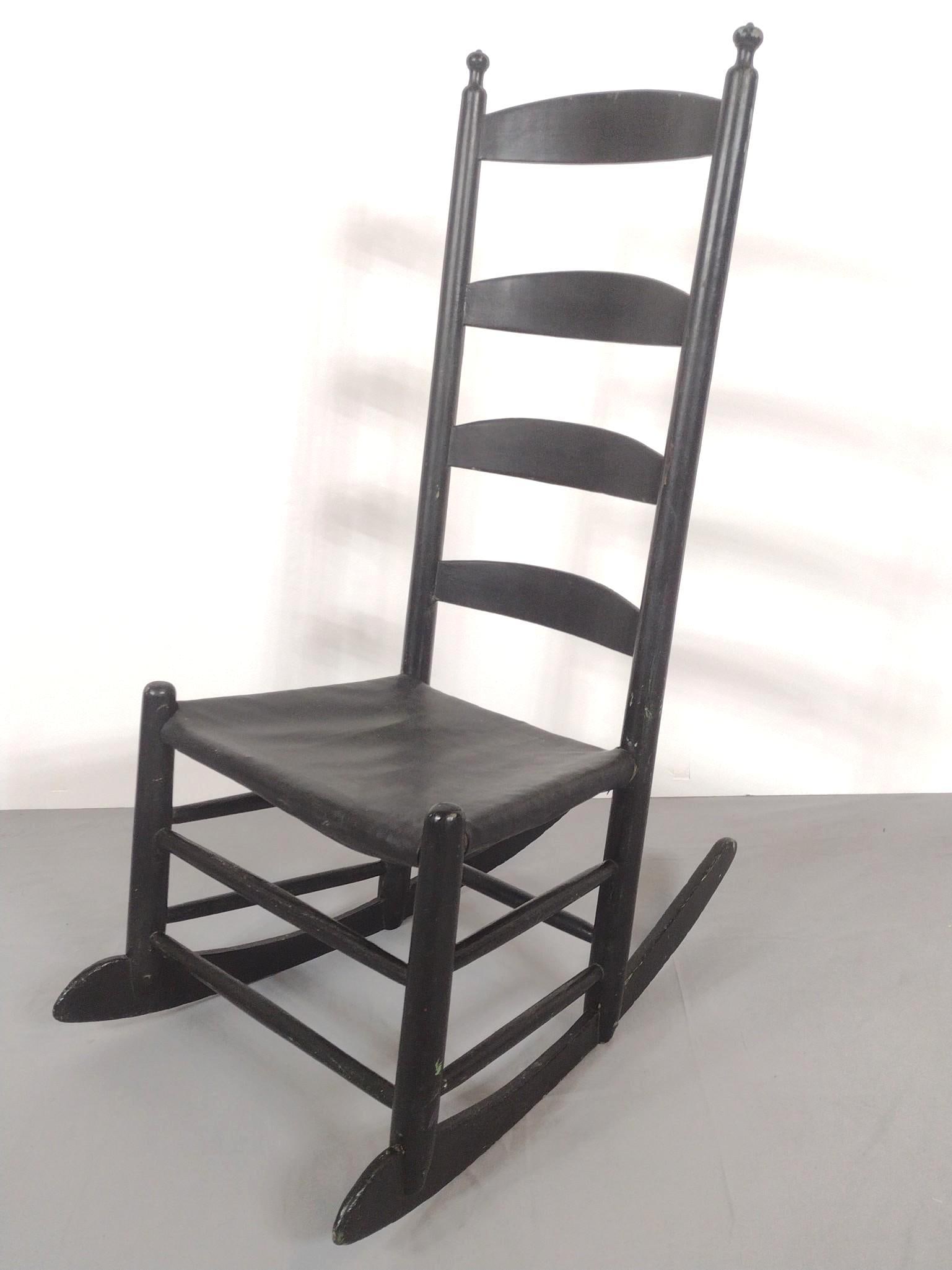 Black Painted Rocking Chair: NOT ELIGIBLE FOR IN-HOUSE SHIPPING. 18-1/4" wide X 29" deep X 40" high. Has scratches and areas of paint loss.