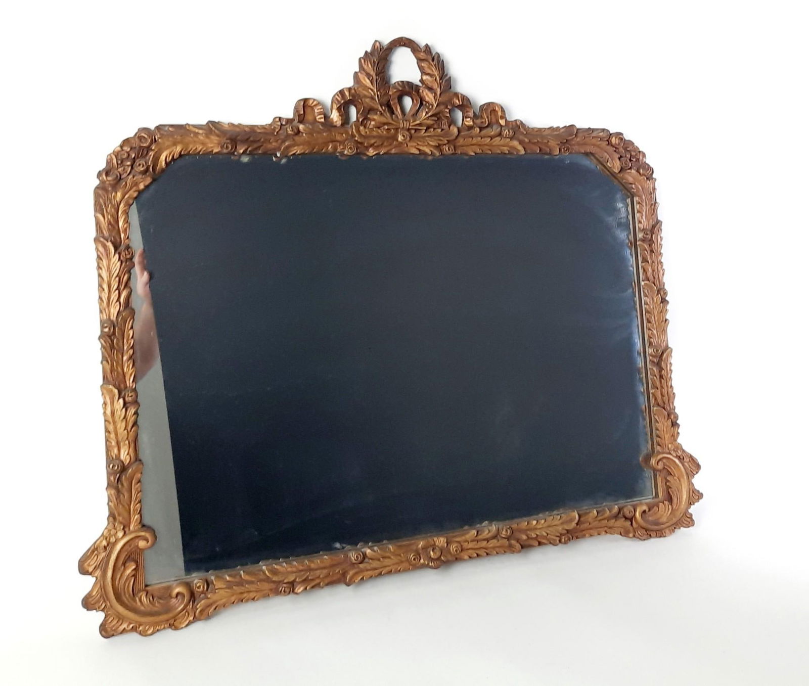 Antique Mirror with Branch Crest: NOT ELIGIBLE FOR IN-HOUSE SHIPPING. Overall with frame: 30-1/2" high x 36" wide. Some losses to frame.