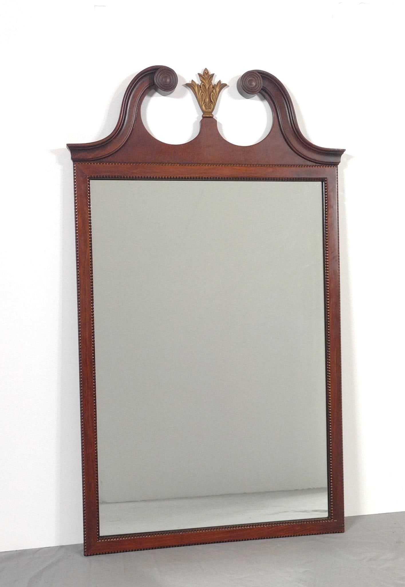 Chippendale Style Mahogany Mirror: NOT ELIGIBLE FOR IN-HOUSE SHIPPING. Overall with frame: 42-3/4" high x 25" wide. Minor wear to frame.
