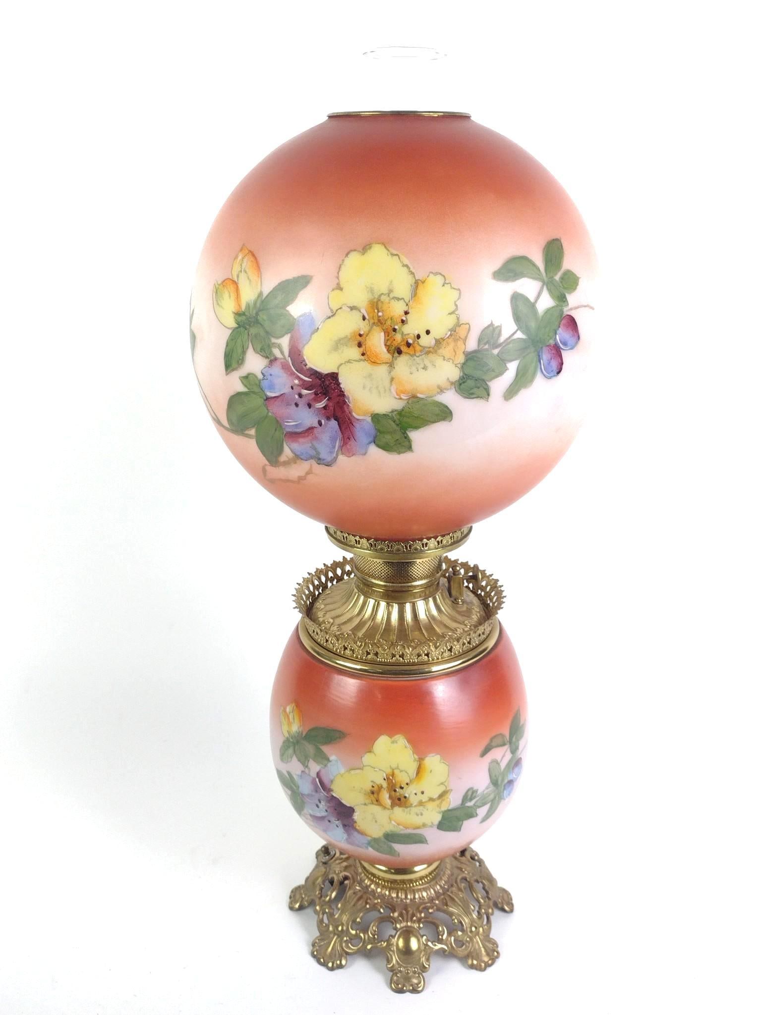 Hand Painted Gone with the Wind Lamp: NOT ELIGIBLE FOR IN-HOUSE SHIPPING. Electrified. Minor imperfections to bottom rim of globe. 26" high x 11" wide. Base 8-1/2".