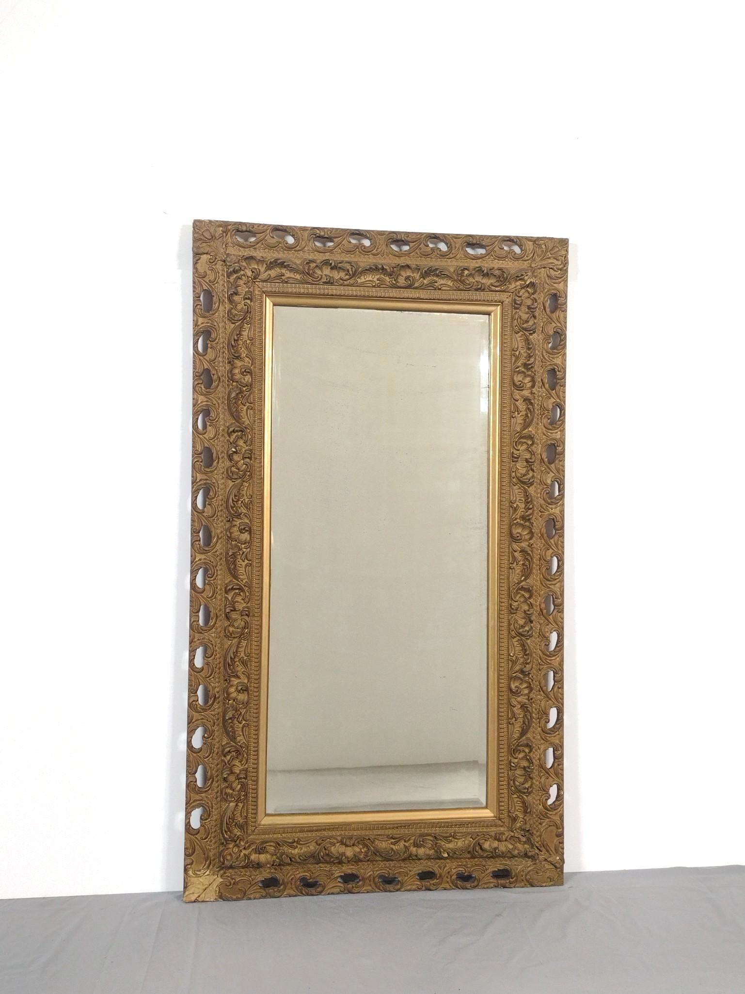 Antique Gilt Mirror with Script Frame: NOT ELIGIBLE FOR IN-HOUSE SHIPPING. Overall with frame 52-1/4" high x 30" wide. Some losses to frame.