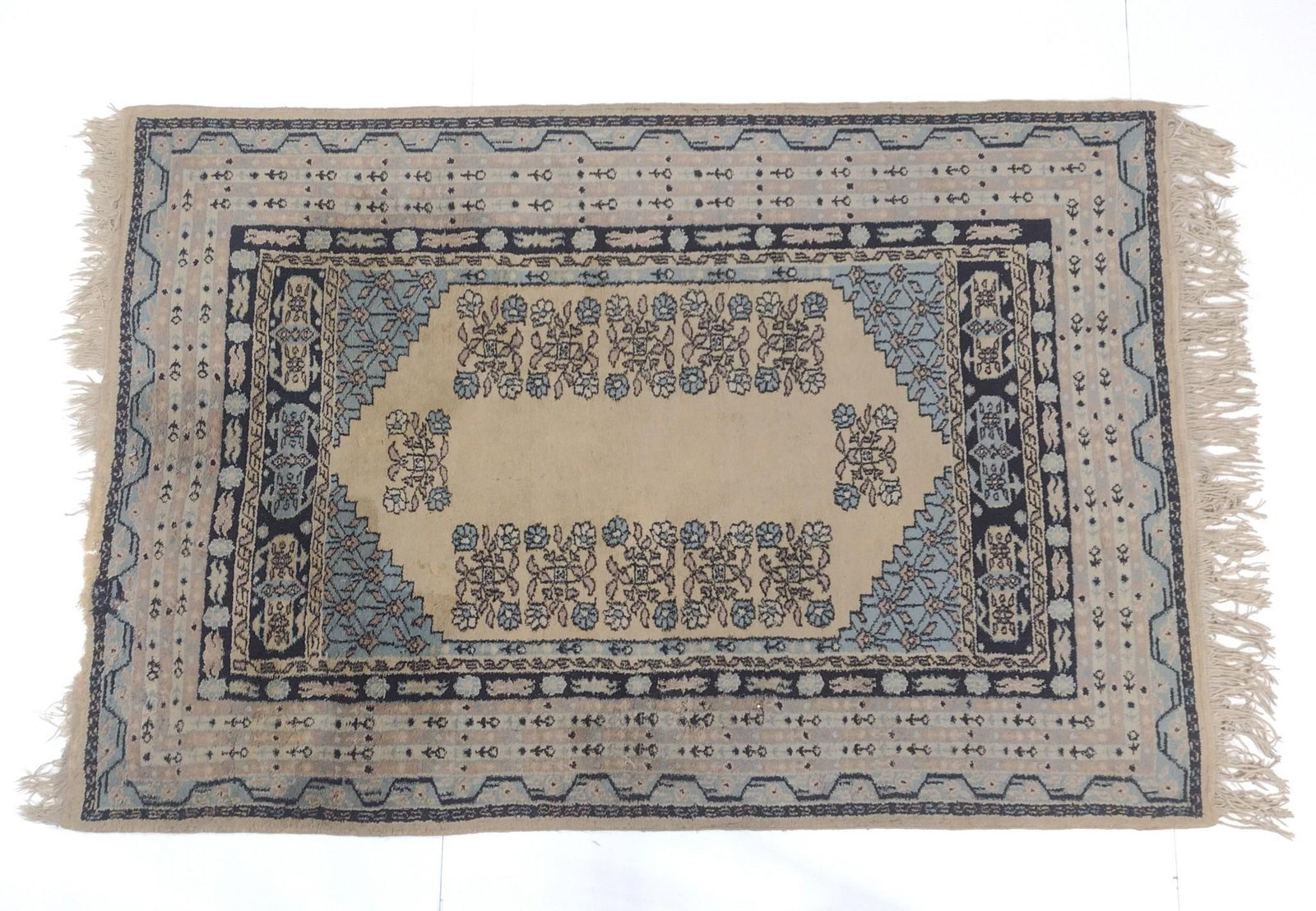 Antique Area Rug with Double Arrow: 4'3" wide X 6'3" long. Has some damage to fringe.