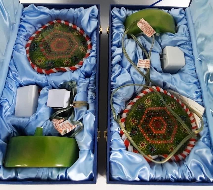 Pair of Alsy Glass Table Lamps: New in cases and un-assembled. One case hinge partially detached. Cases 7-1/2" x 18" x 9-1/2". Includes assembly instructions.