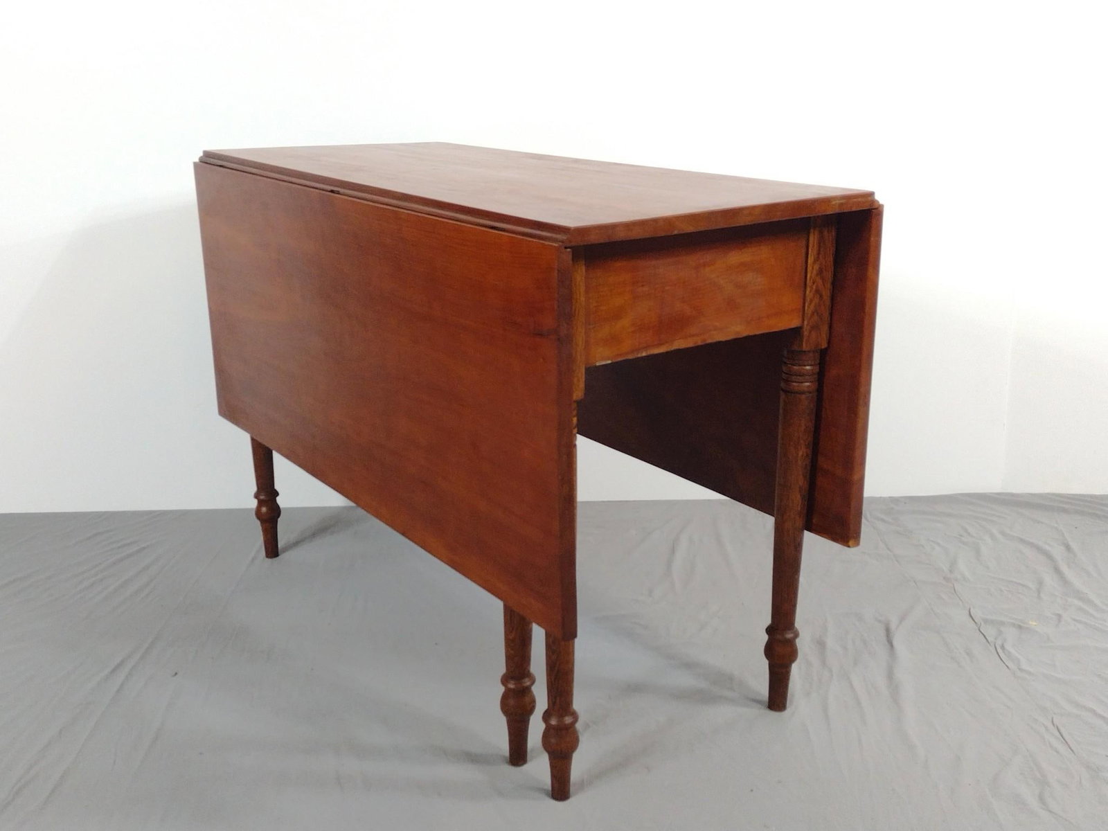 Drop Side Dining Table: NOT ELIGIBLE FOR IN-HOUSE SHIPPING. Open 54-3/4", closed 20" wide X 43-1/2" deep X 29-1/2" high.