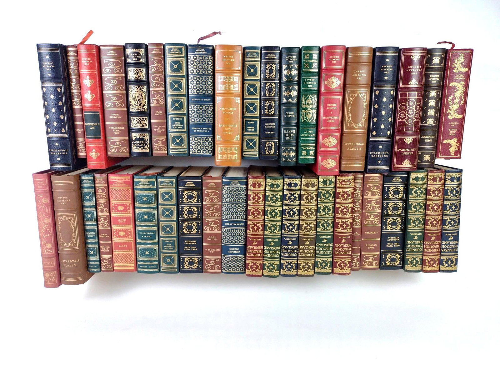 41 Leatherbound Classics: NOT ELIGIBLE FOR IN-HOUSE SHIPPING. Includes The Three Musketeers, War and Peace, Complete Stories of Edgar Allan Poe, Journeys Through Bookland, and many more.