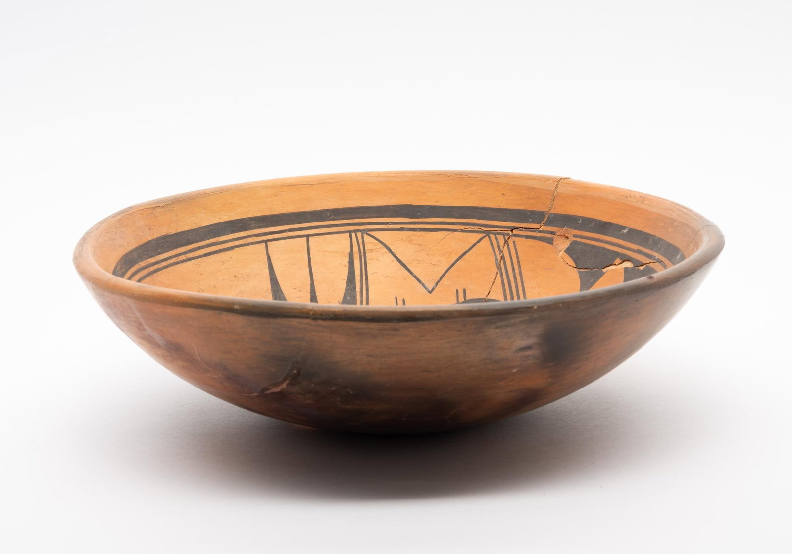 Hopi Bowl by Ella Mae Talashie: NOT ELIGIBLE FOR IN-HOUSE SHIPPING. A nice sized Hopi bowl with polychrome decoration signed and made by Ella Mae Talashie (1921-1995) who worked during the 1970s at Walpi on the First Mesa. Measureme