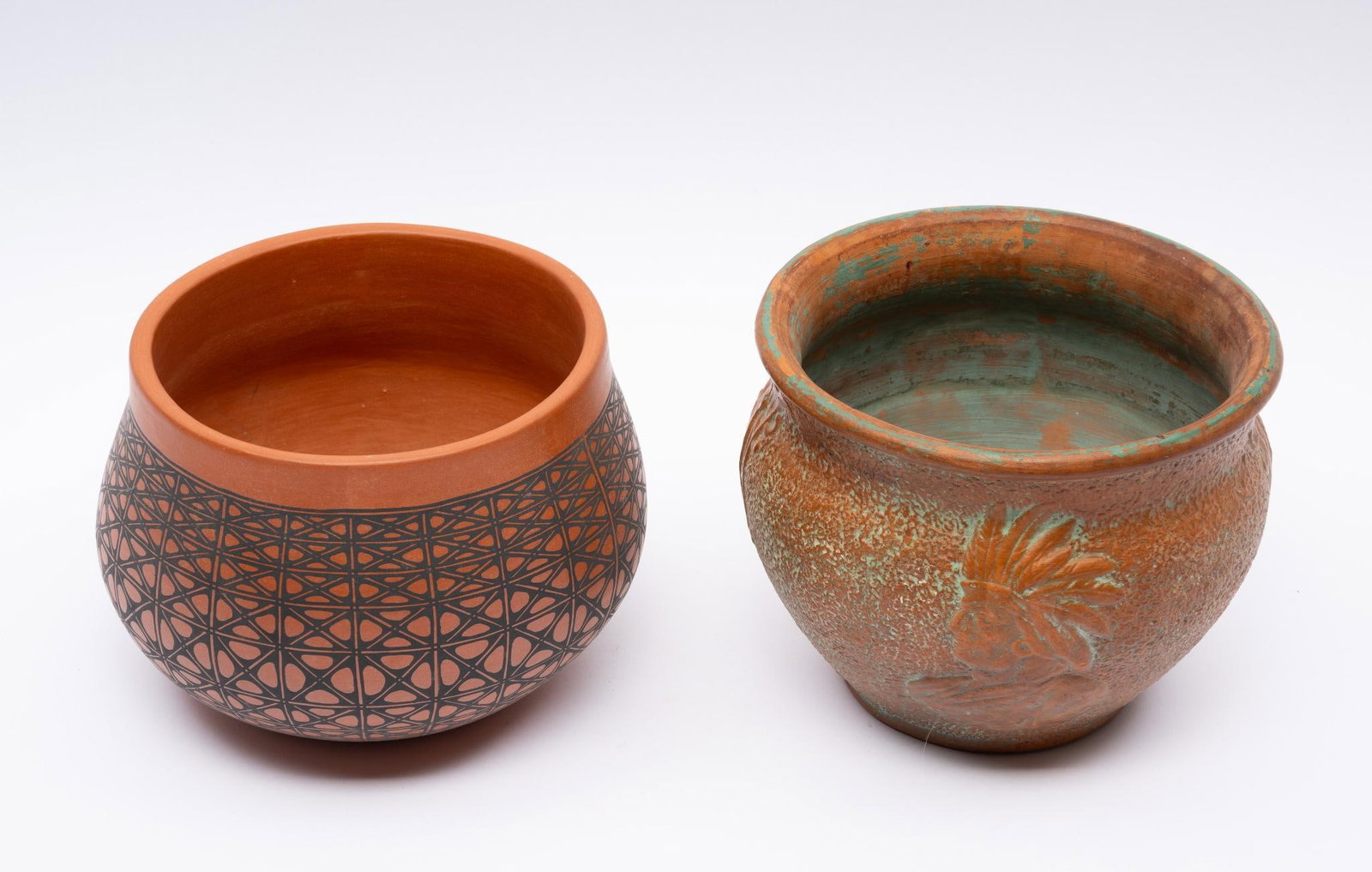 Contemporary Santo Domingo Pueblo Pot: A very fine line decorated red Olla signed JG and SDP (Santo Domingo Puelbo) and a corn motif. Superb quality pot. Together with a Midwestern commercial jardiniere incorporating an Indian chief profil