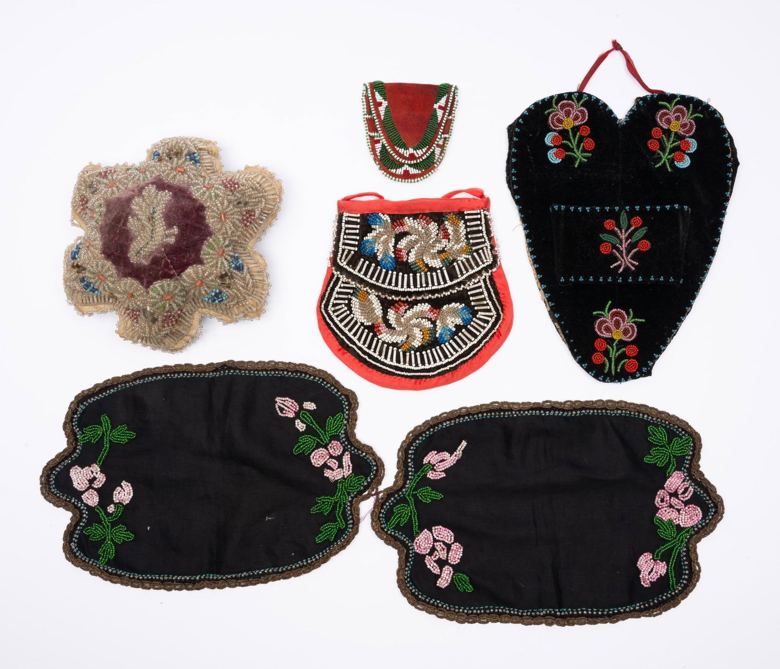 5 Beaded Items Including Iroquois: A group of five beaded items dating from the early to mid 20th century. A pair of unfinished beaded gauntlets, a beaded Iroquois pin cushion or whimsy, a single beaded upper or vamp from a moccasin, a