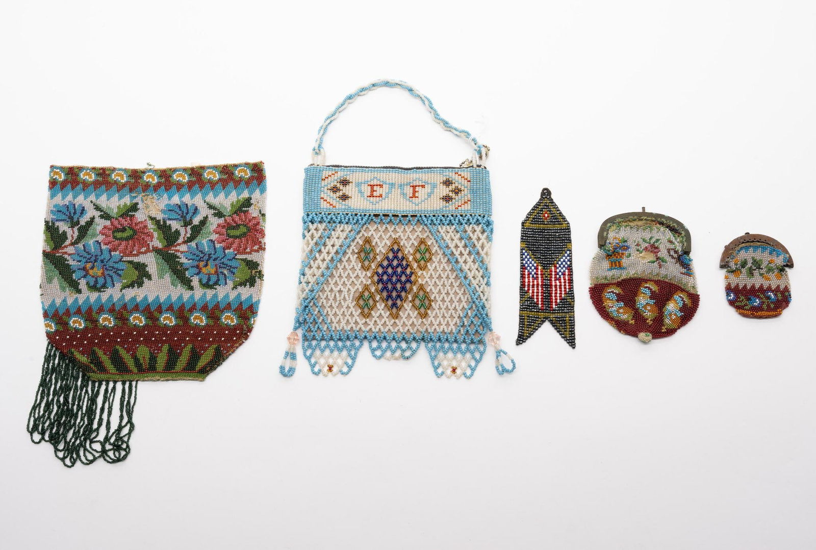 5 Examples of Victorian Beadwork: A group of five, bags and watch fobs, Victorian and Edwardian examples of ornamental beadwork. The jury remains out as to whether these were Indian made for the outside world or are simply examples of