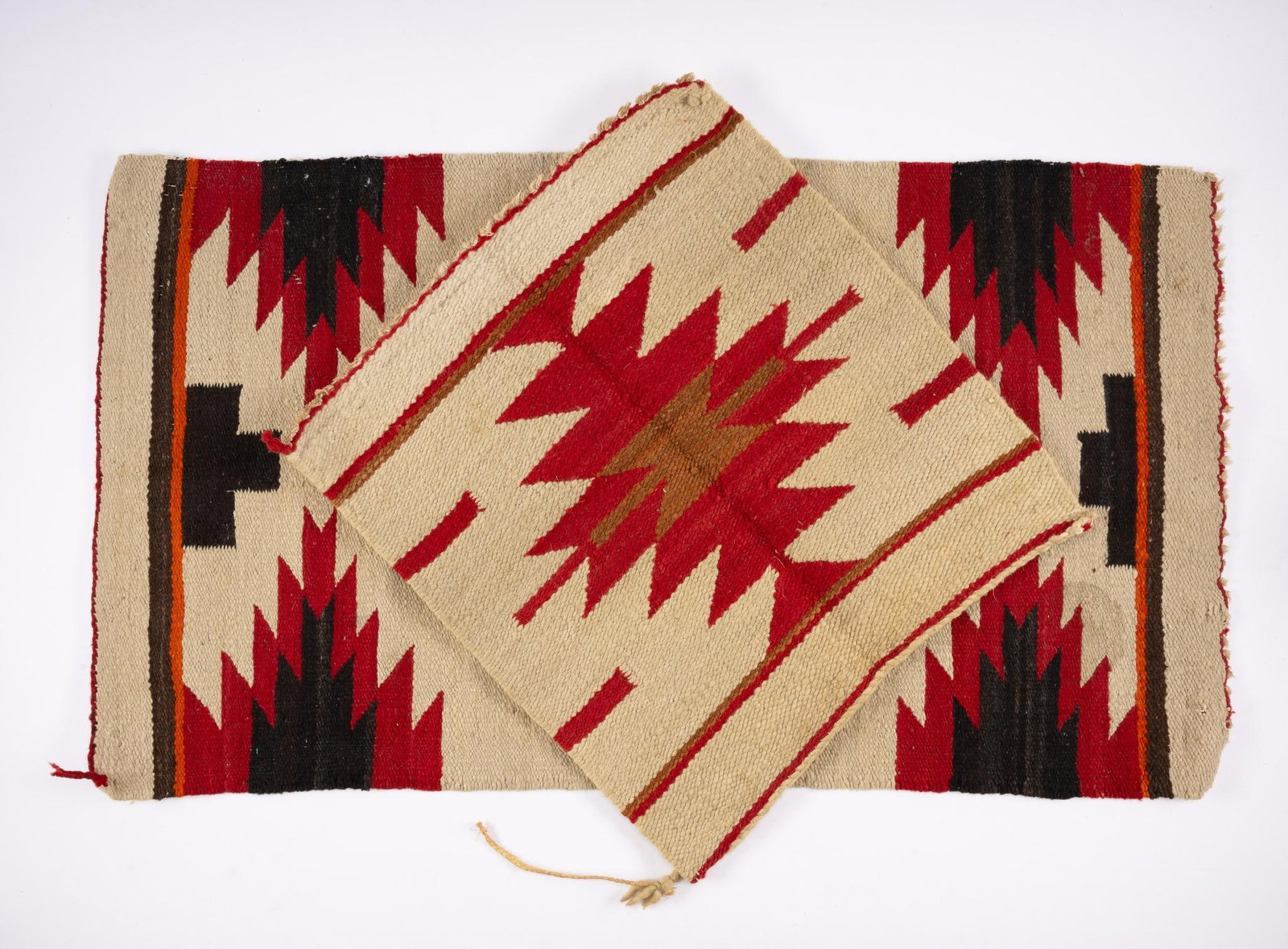 2 Navajo Weavings: Two very nice Navajo weavings. The first a lovely eye dazzler and the second a geometric. Measurements: Square 19" x 18". Runner 36" x 20-1/2". Condition: Due to being in storage for a number of years