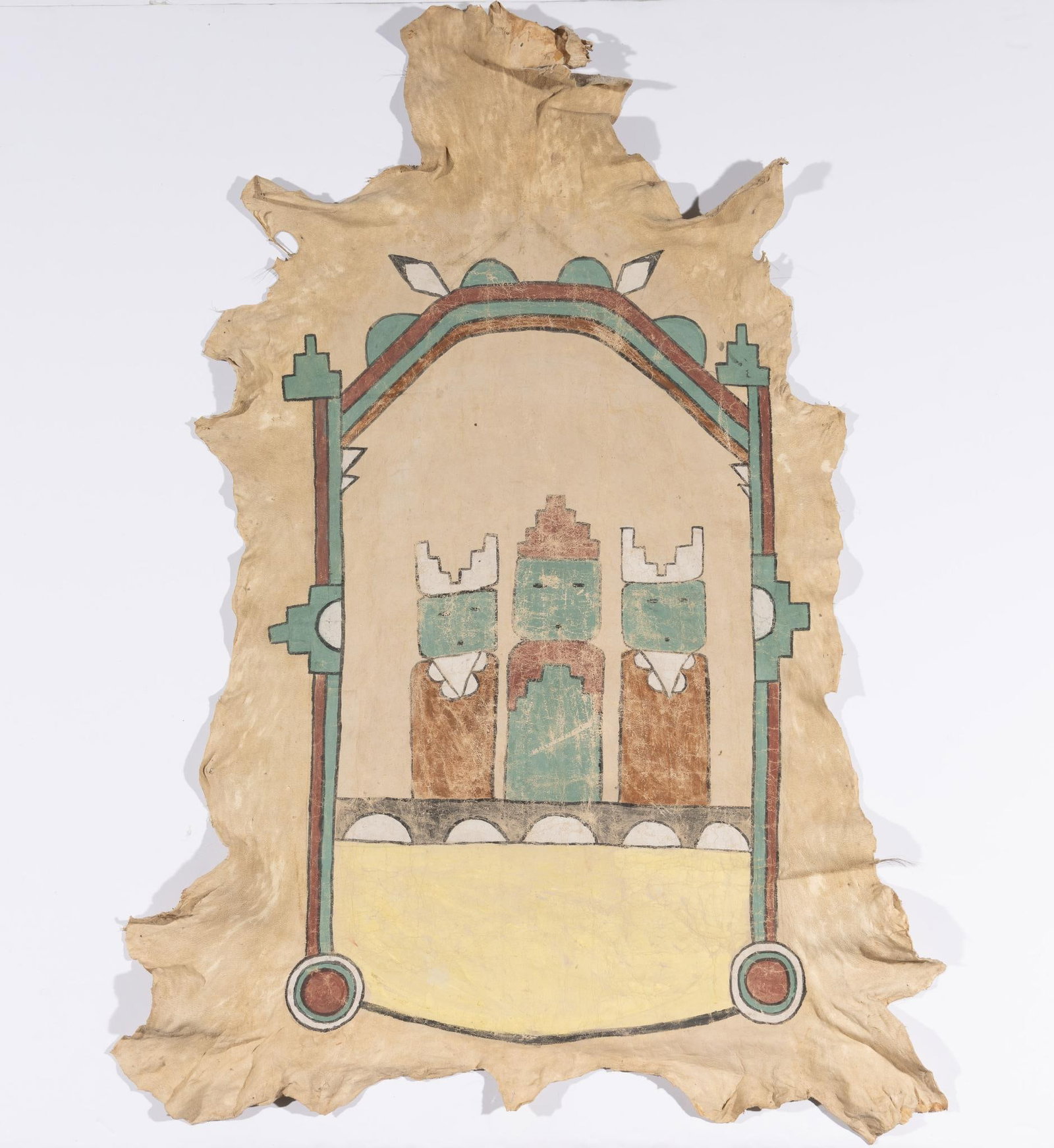 Unusual Hide Painting: This unusual mineral pigment on hide painting was probably produced for the trade market rather than tribal use. It shows three figures perhaps loosely interpreting Katsina figures. Southwestern proba