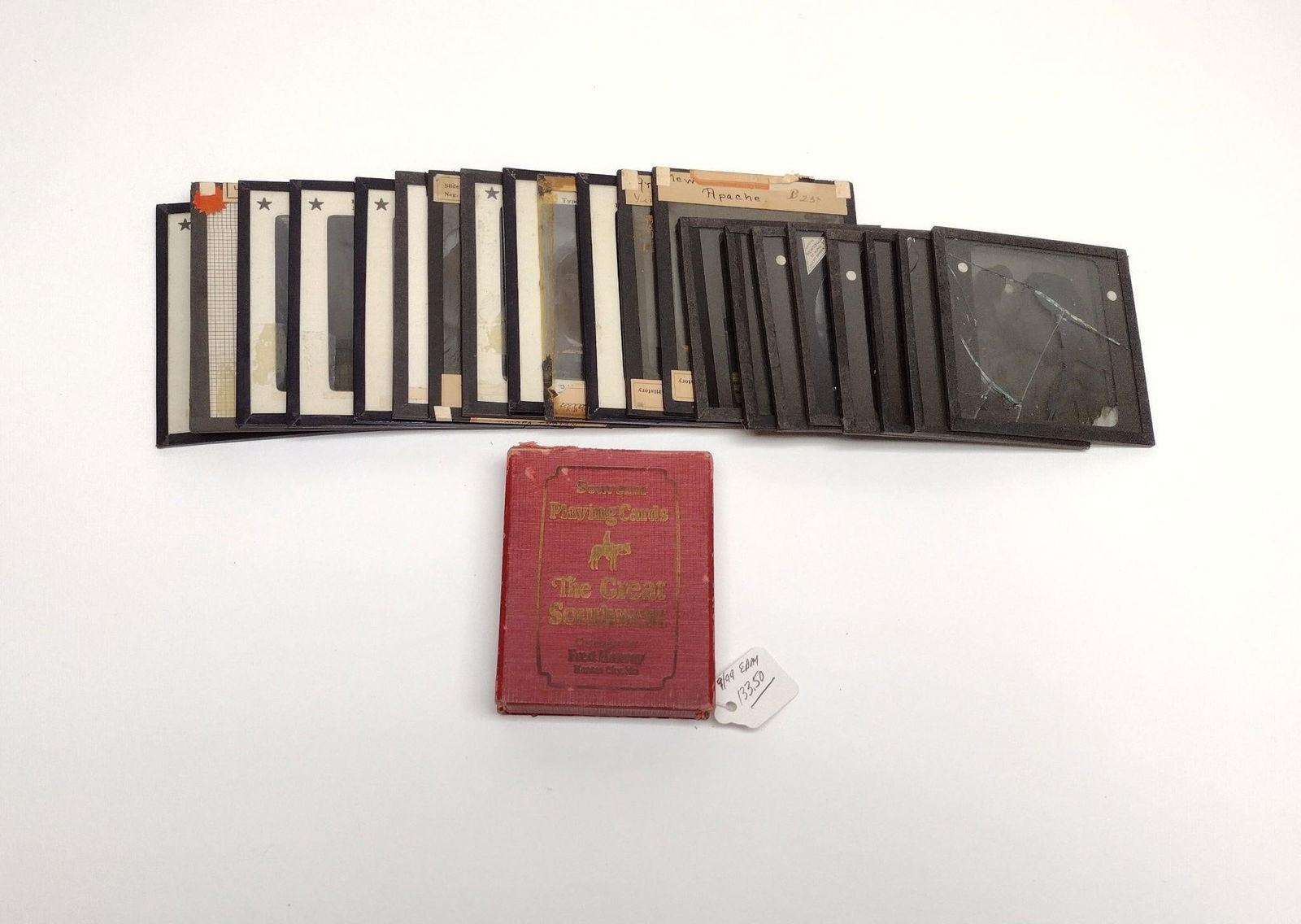 Deck of Southwestern Railroad Playing Cards and 30 Magic Lantern Slides: A collection of 30 magic lantern slides depicting various Native Americans (circa 1890-1920) and a fine set of Railroad playing cards depicting southwestern scenes and American Indians. Measurements: