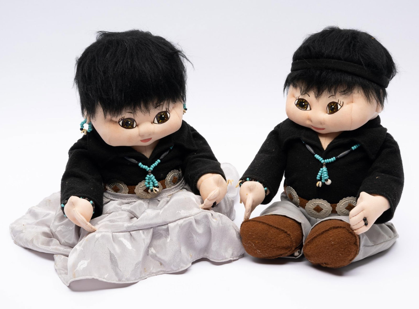 Pair of Navajo Dolls by Frida Lemon: Pair of Navajo dolls with exhibition tag stating made by Frida Limon late 20th century. Measurements: 11". Condition: Overall fine.