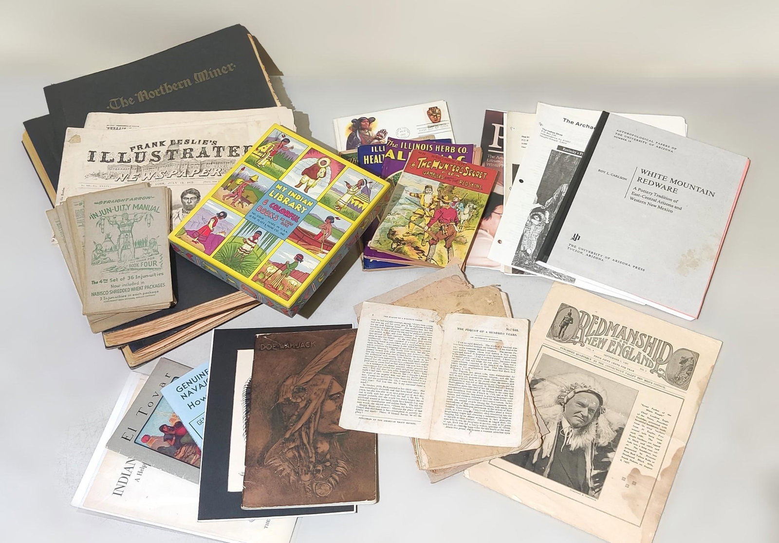 Large Lot of American Indian Ephemera: NOT ELIGIBLE FOR IN-HOUSE SHIPPING. Includes stamps, early advertisement, magazines, newspapers, and more. Condition: overall good with normal wear and tear due to age and storage.