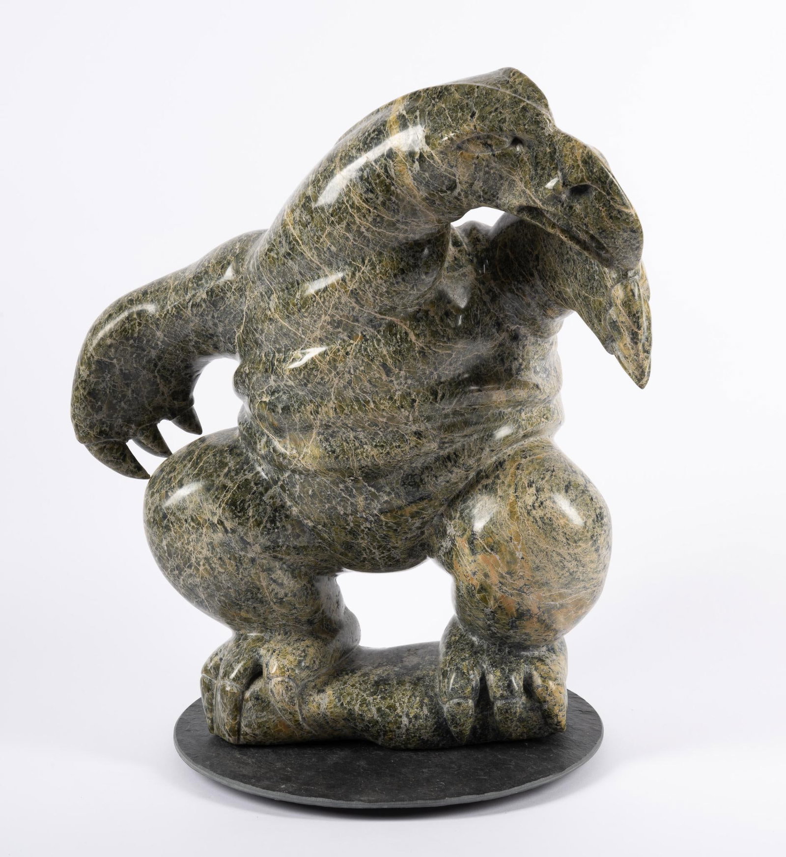 Stone Carving by Inuit Kaiwak Ashoona: NOT ELIGIBLE FOR IN-HOUSE SHIPPING A large carving by Kiugak (Kiawak) Ashoona, Inuit, Baffin Island, Kinngait, Canada 1933 - 2014. Spirit Bird Creature with height 18", no damage noted. Literature: pa
