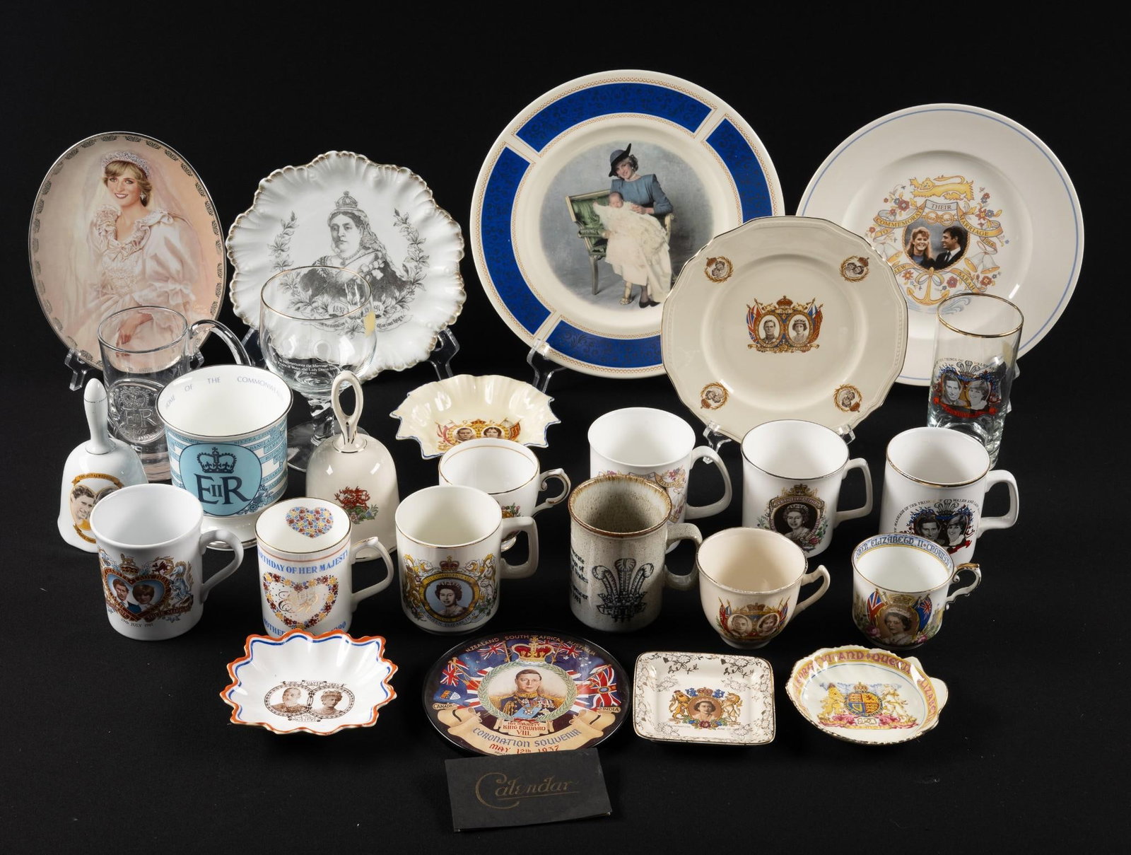 26 Royal Commemoratives incl King George: Also includes Queen Elizabeth, Prince Charles, and more. 1" to 6" high.