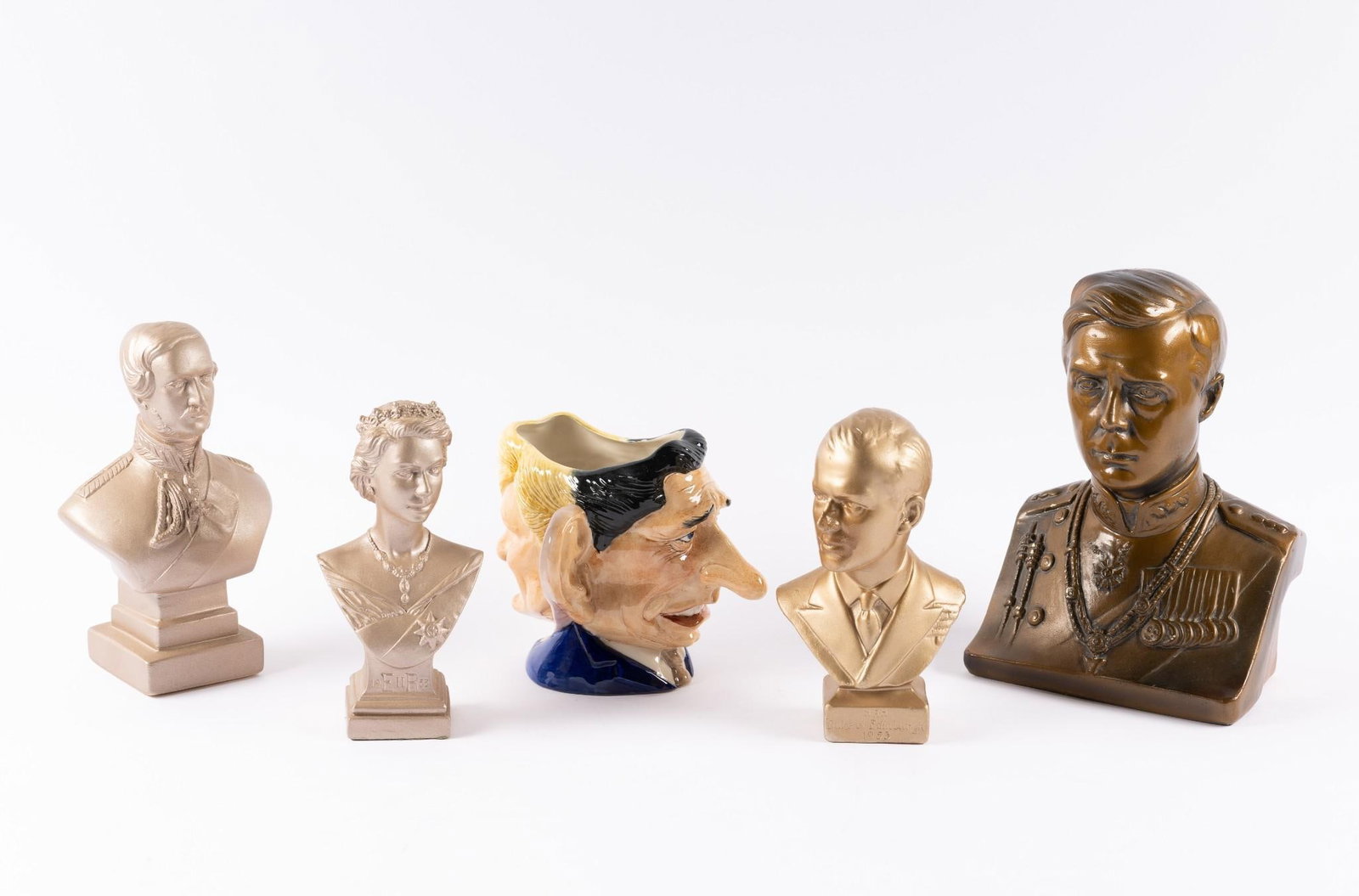 5 Royal Commemoratives incl Sitting Cup and Busts: Includes Prince Albert, Prince Charles, Princess Diana, and more. 5-3/4" to 9-1/2" high.