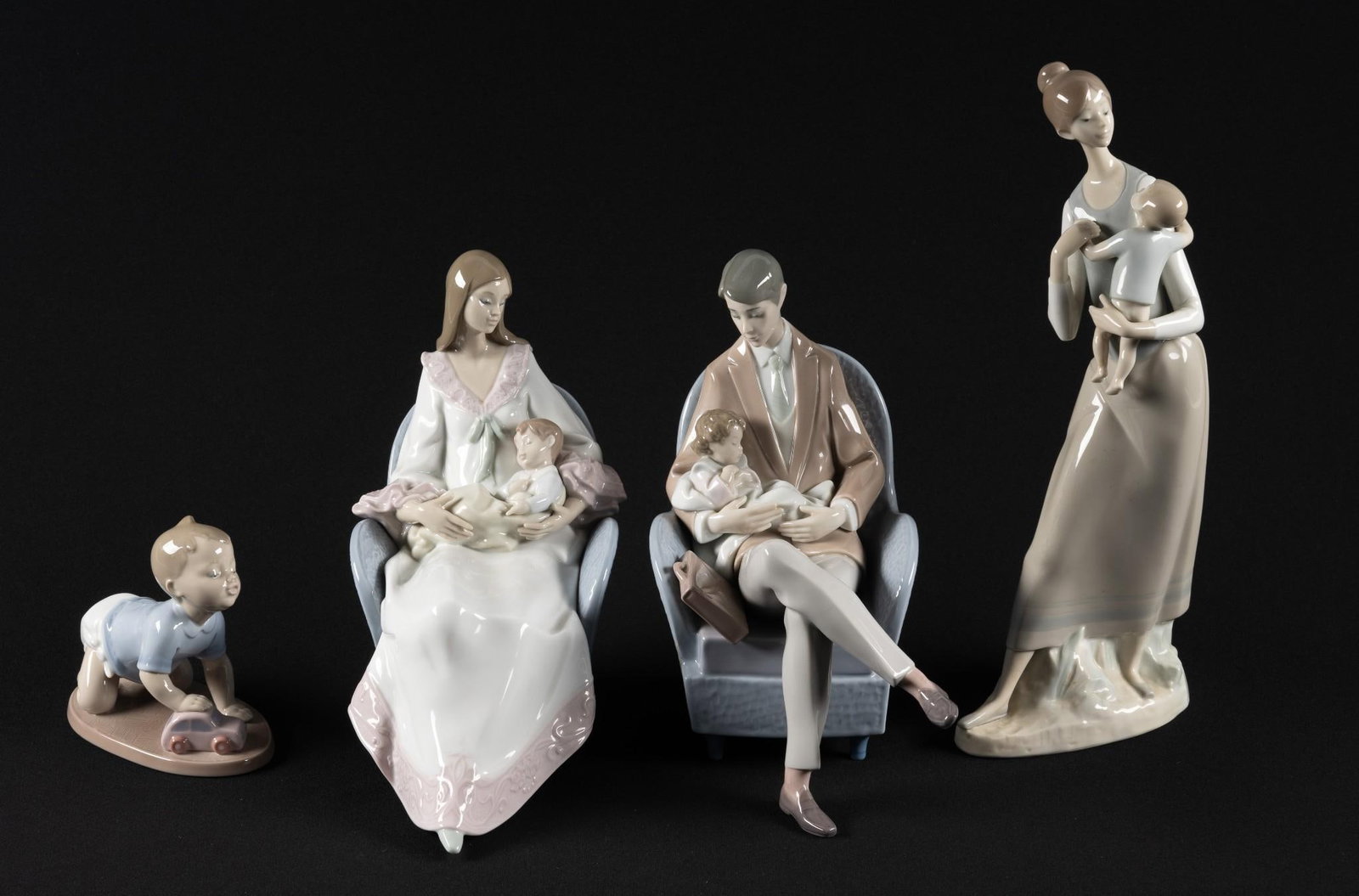 4 Parenthood Lladro Figurines: 4-1/2" to 13-1/4" high.