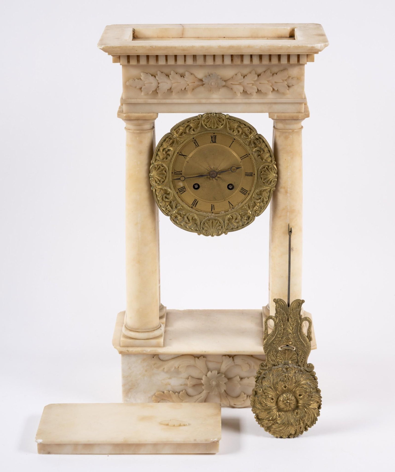 Marble Mantle Clock: 9-1/8" wide x 5-1/4" deep x 16-1/4" high. Top piece not attached. Cracks to marble. Chips to edges. Piece missing from design on bottom. Not running.