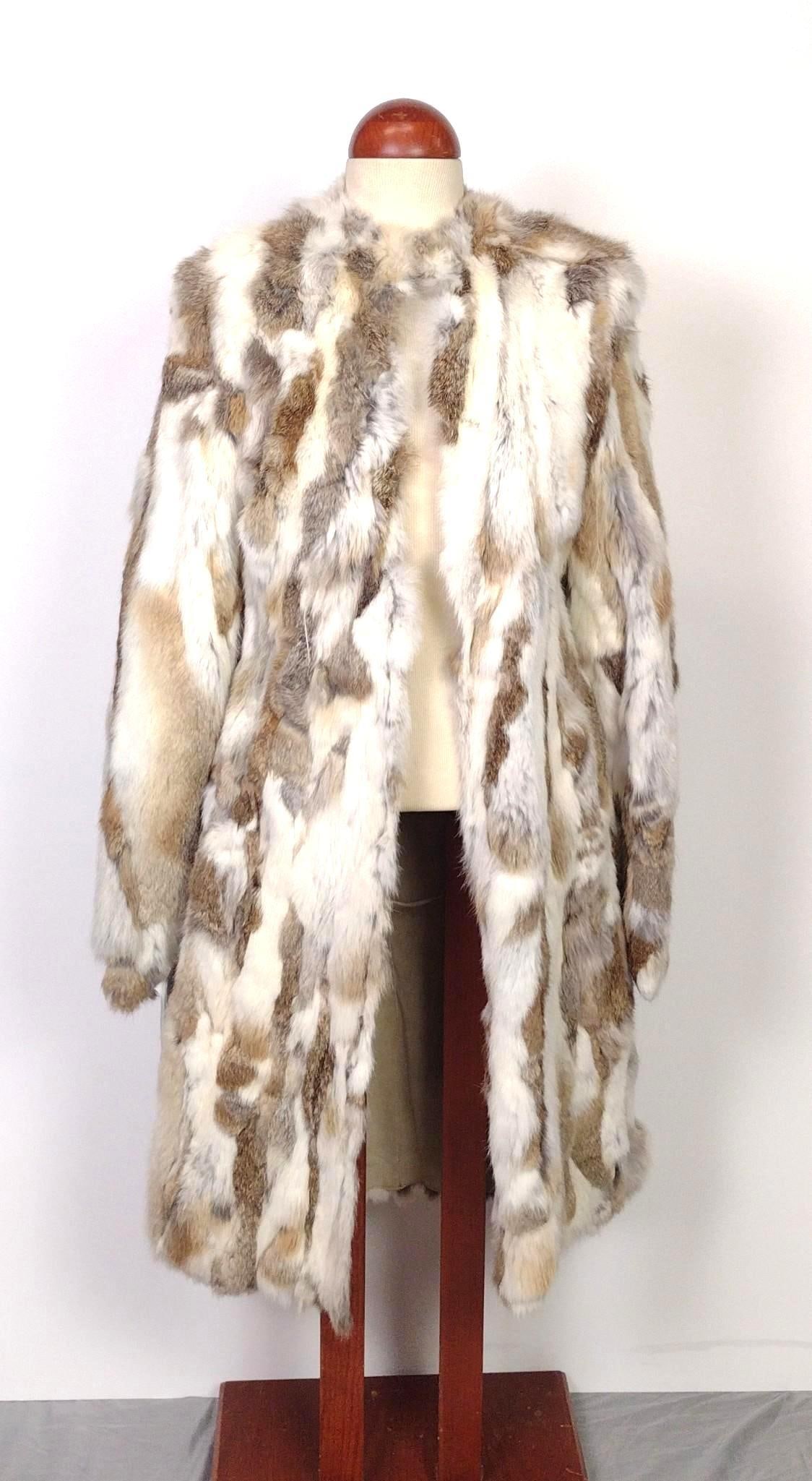 Heather Section Rabbit Fur Coat: NOT ELIGIBLE FOR IN-HOUSE SHIPPING. Unmarked. Kept at Muscalus Furs in Harrisburg, PA. 17" shoulder width x 40" total length. 20" sleeve.