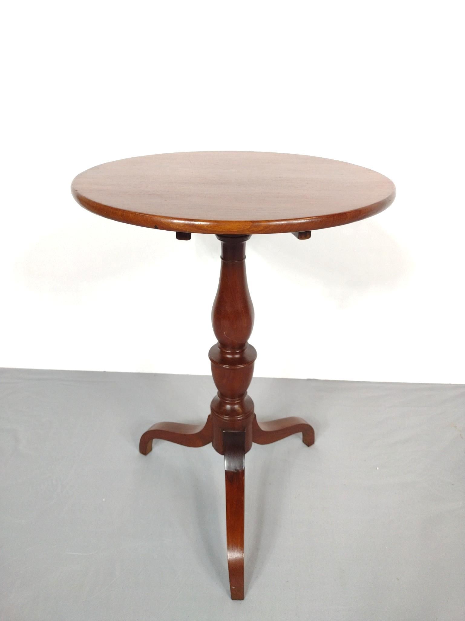 19th Century Tilt Top Candle Stand: NOT ELIGIBLE FOR IN-HOUSE SHIPPING. Vasi form central stand with trifed feed. Refinished. Original hardware. 19-1/2" wide X 19-1/2" deep X 28" high.