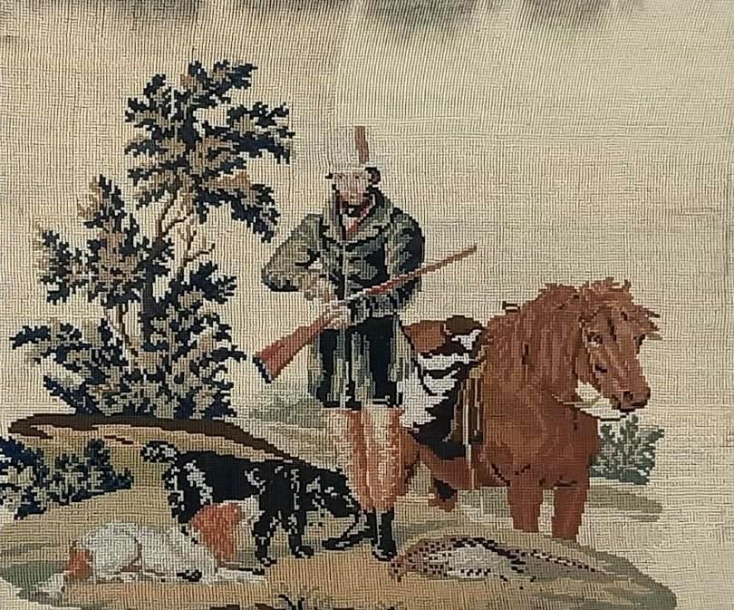 Victorian Needlepoint of Hunter: NOT ELIGIBLE FOR IN-HOUSE SHIPPING. Needlepoint, 19th century. Losses and wear. Wear to frame. Staining to needlepoint.17" high x 19-1/2" wide Overall 24" high x 27" wide.