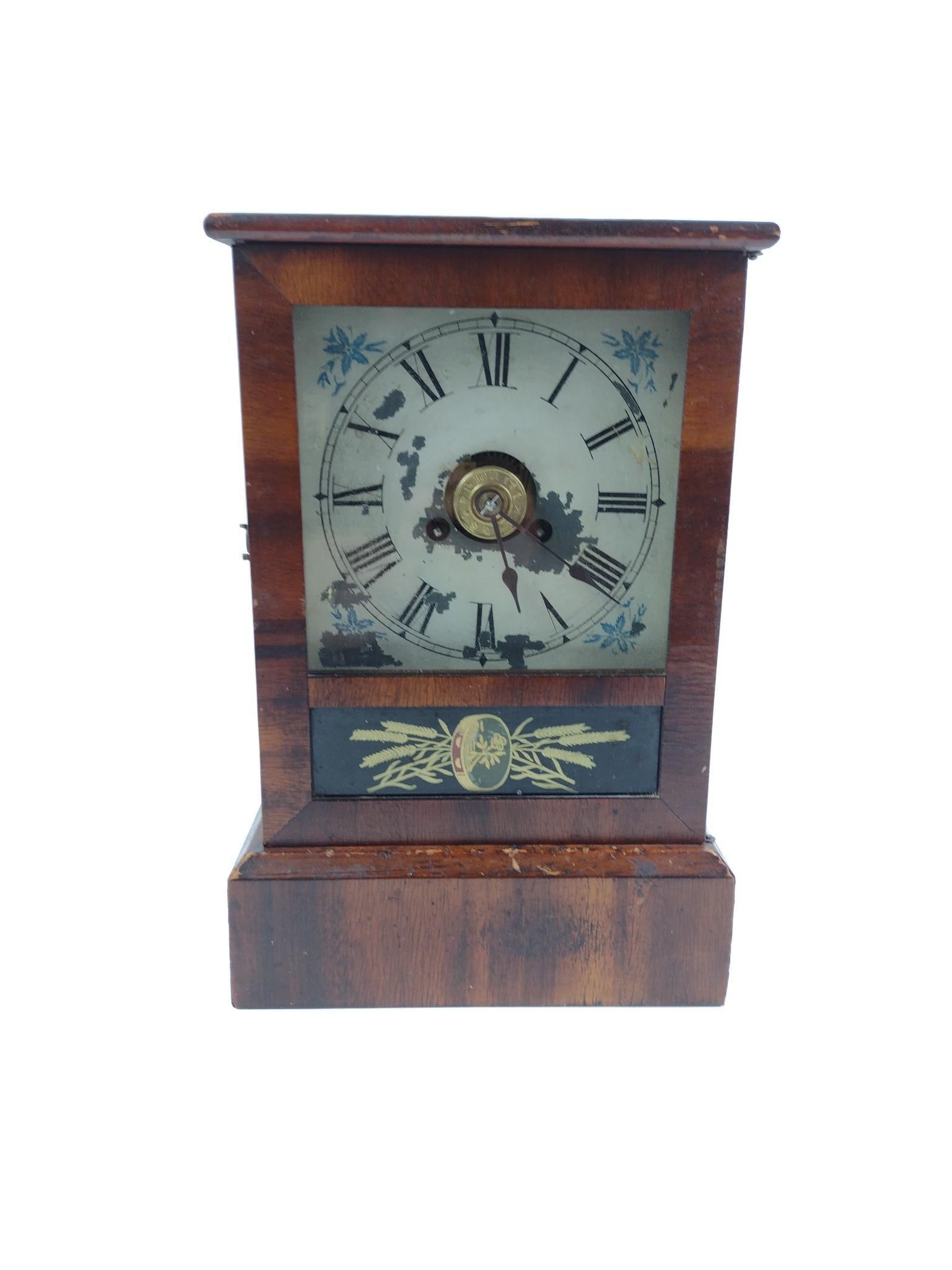 Antique Mantel Clock: Running. Paint loss to clock face. 5" diameter clock face. Overall 7-1/2" wide x 11-1/2" high.