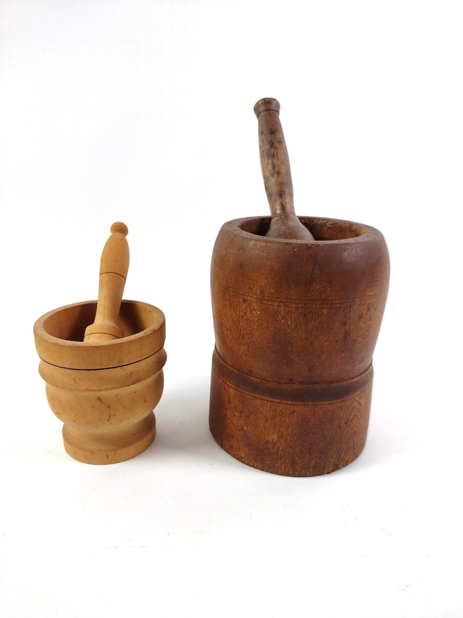 2 Antique Mortar and Pestles: Both turned with wood. 7" to 8" high.