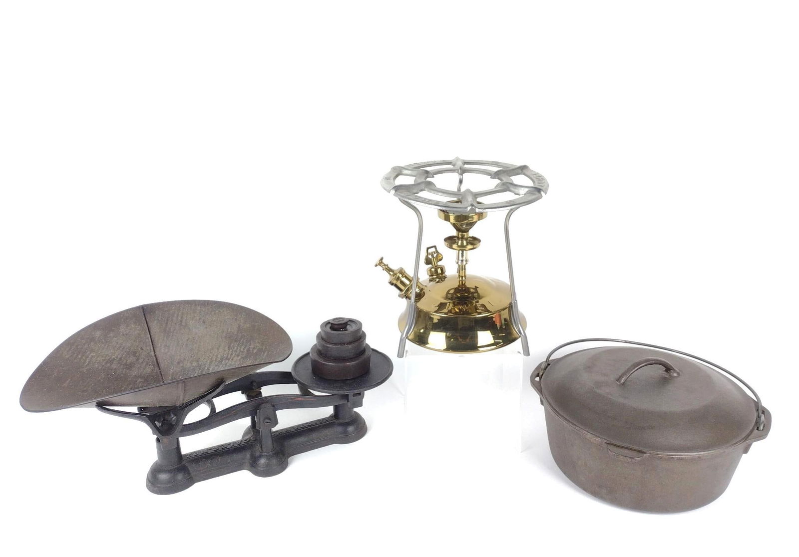 Cast Iron Dutch Oven with Juwel Trivet / Burner and Scale: Dutch oven size 8. Trivet and burner: 9-1/2" high. Dutch oven 6" high. Marked DO MADE IN USA 8.