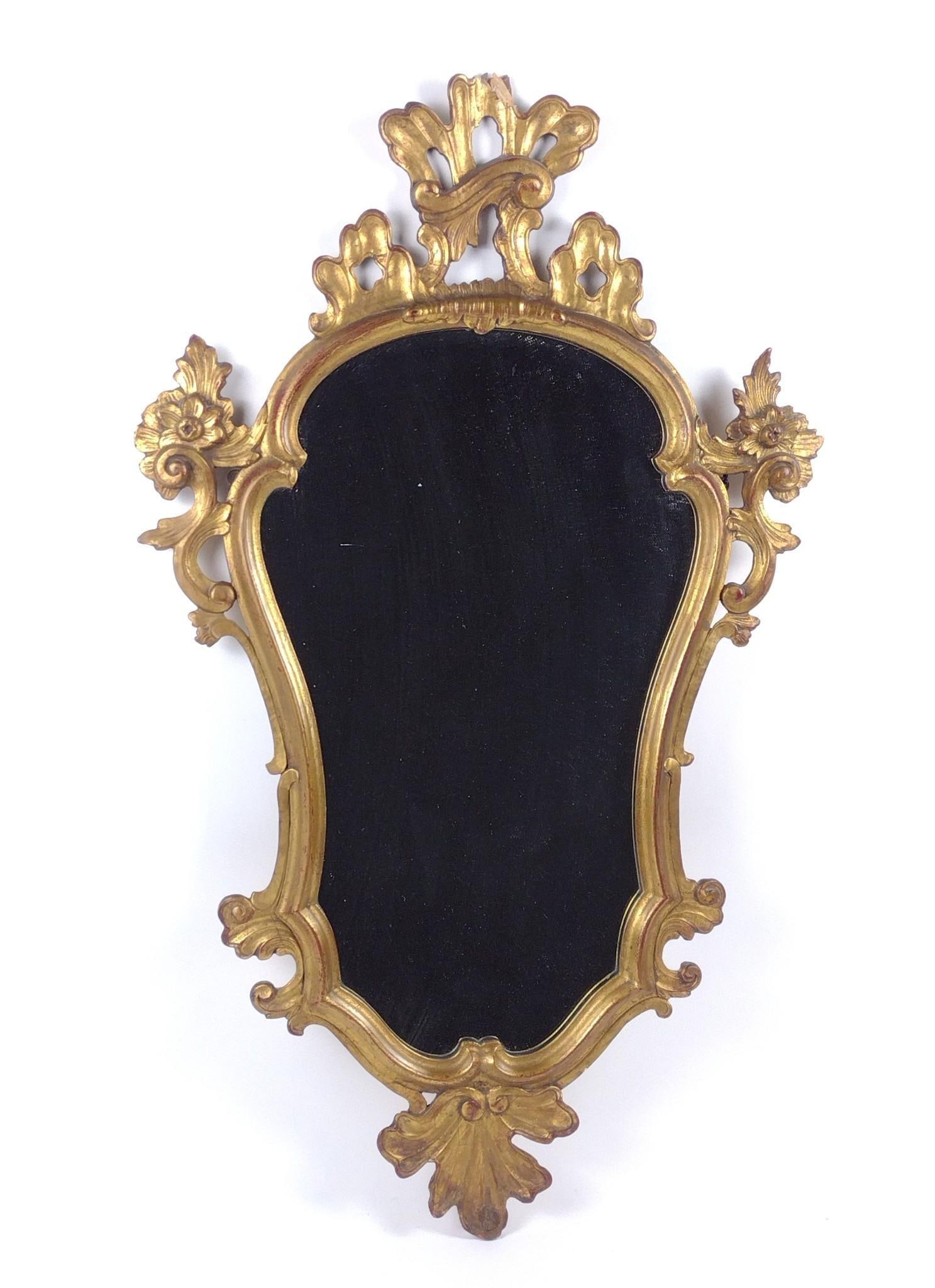Gilt Wall Mirror: NOT ELIGIBLE FOR IN-HOUSE SHIPPING. Overall with frame: 40" high x 23-1/2" wide. Top with loss. Pieces included, but not attached.
